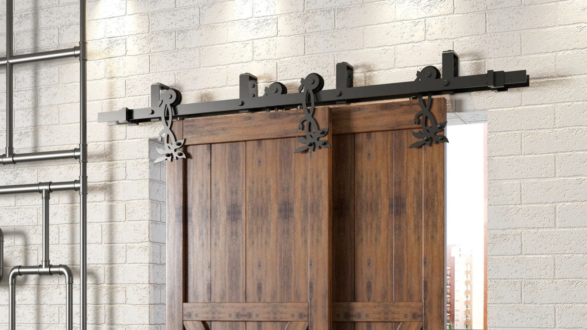 Close-up of two dark wood bypass barn doors hung on black sliding hardware with decorative flower-shaped roller hangers. The doors are set against a white brick wall, with industrial-style piping visible on the left.