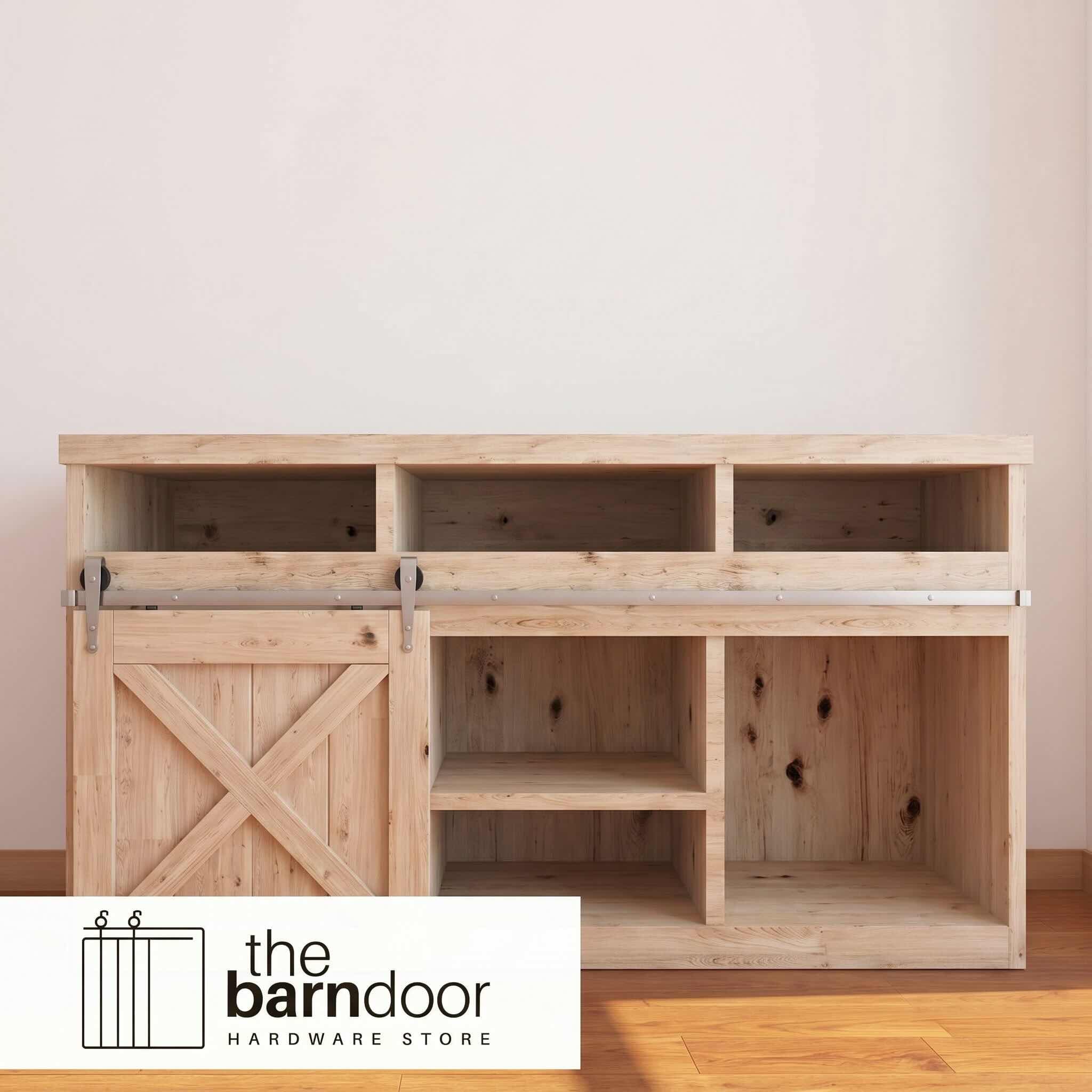 Arrow cabinet barn door hardware kit in a brushed nickel finish, mounted on a small cabinet door.
