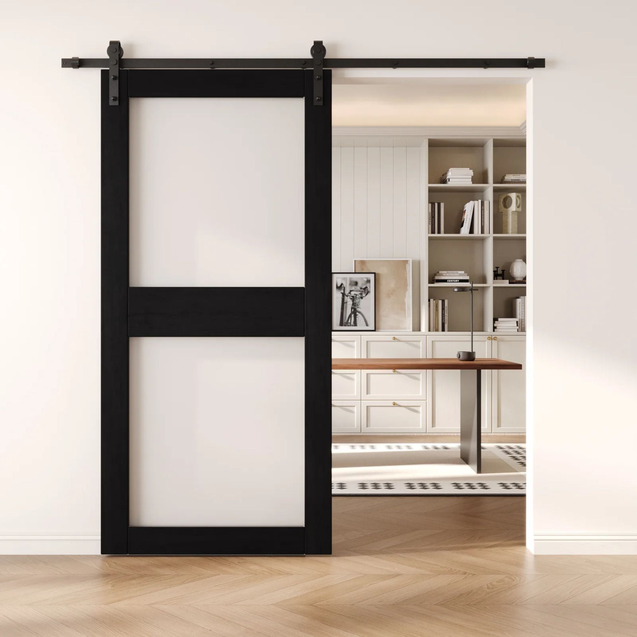Barn door with black frame and glass panels sliding open in a modern interior setting.