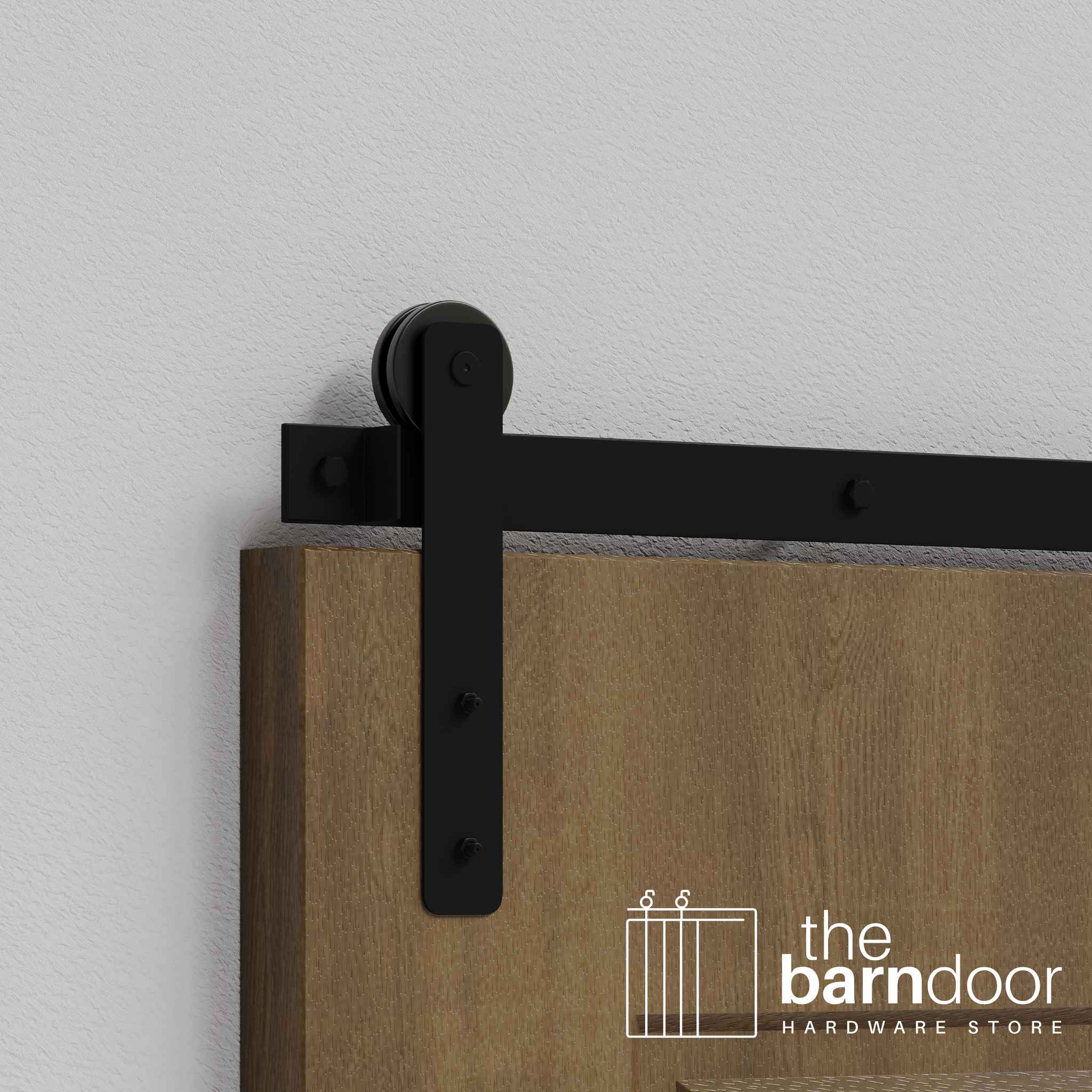 Close-up of Black Straight Strap Single Track barn door hardware installed on a wooden door panel.