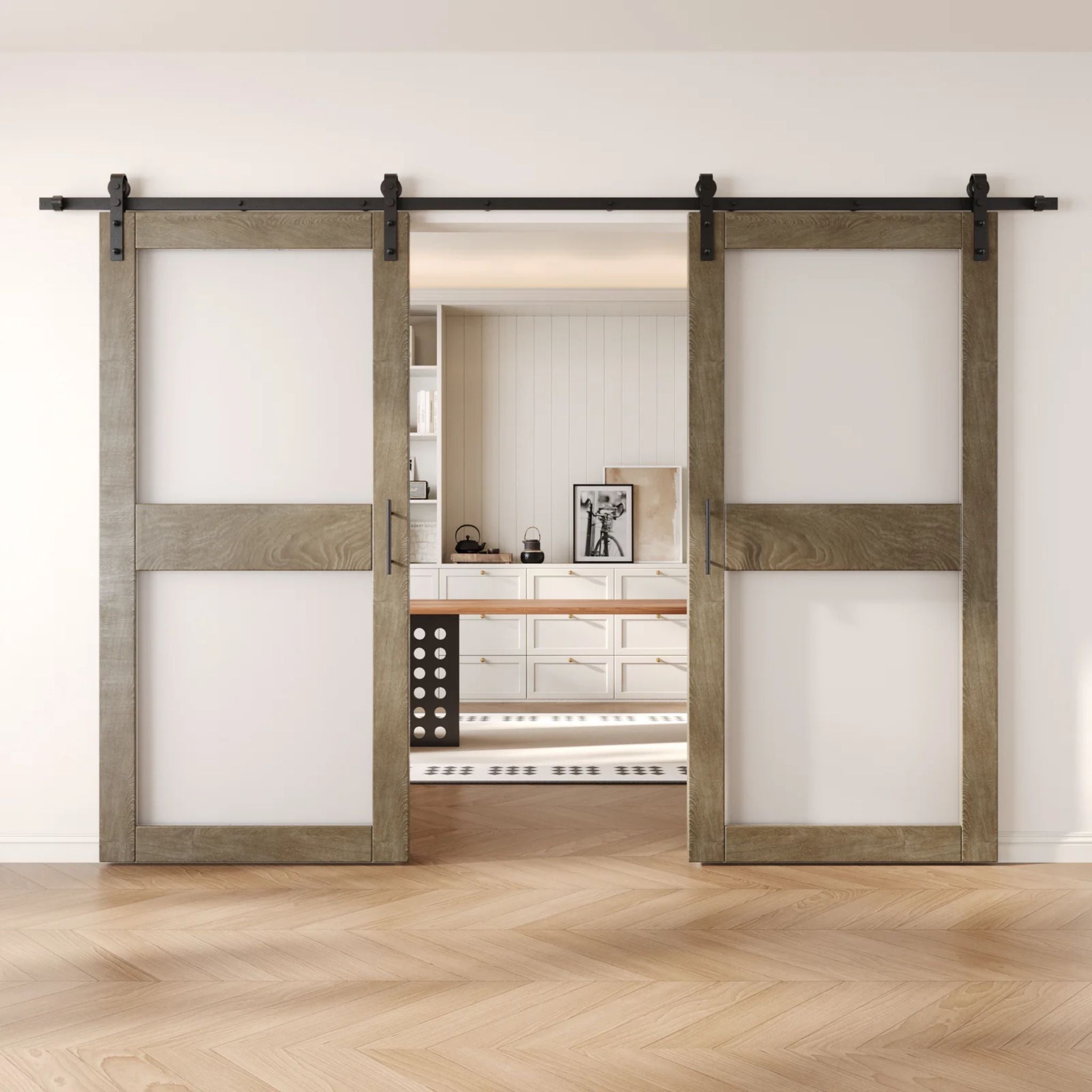 Classic gray wooden sliding glass panel barn doors with black hardware in a modern interior setting.