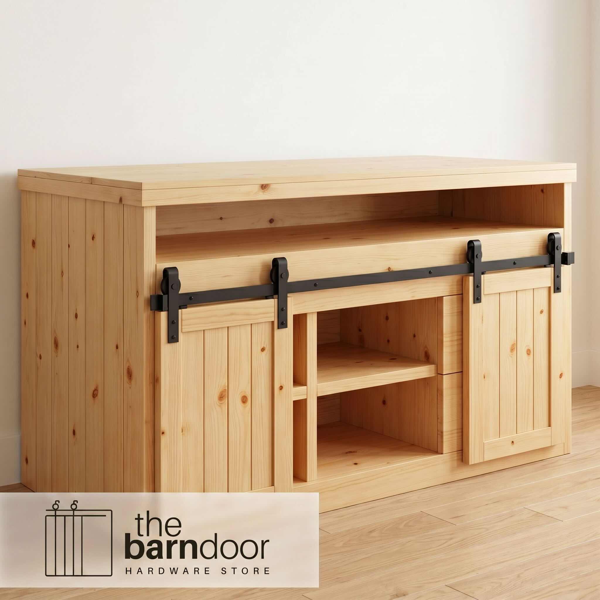 Classic J-Strap cabinet barn door hardware kit in a matte black finish, mounted on a small cabinet door.