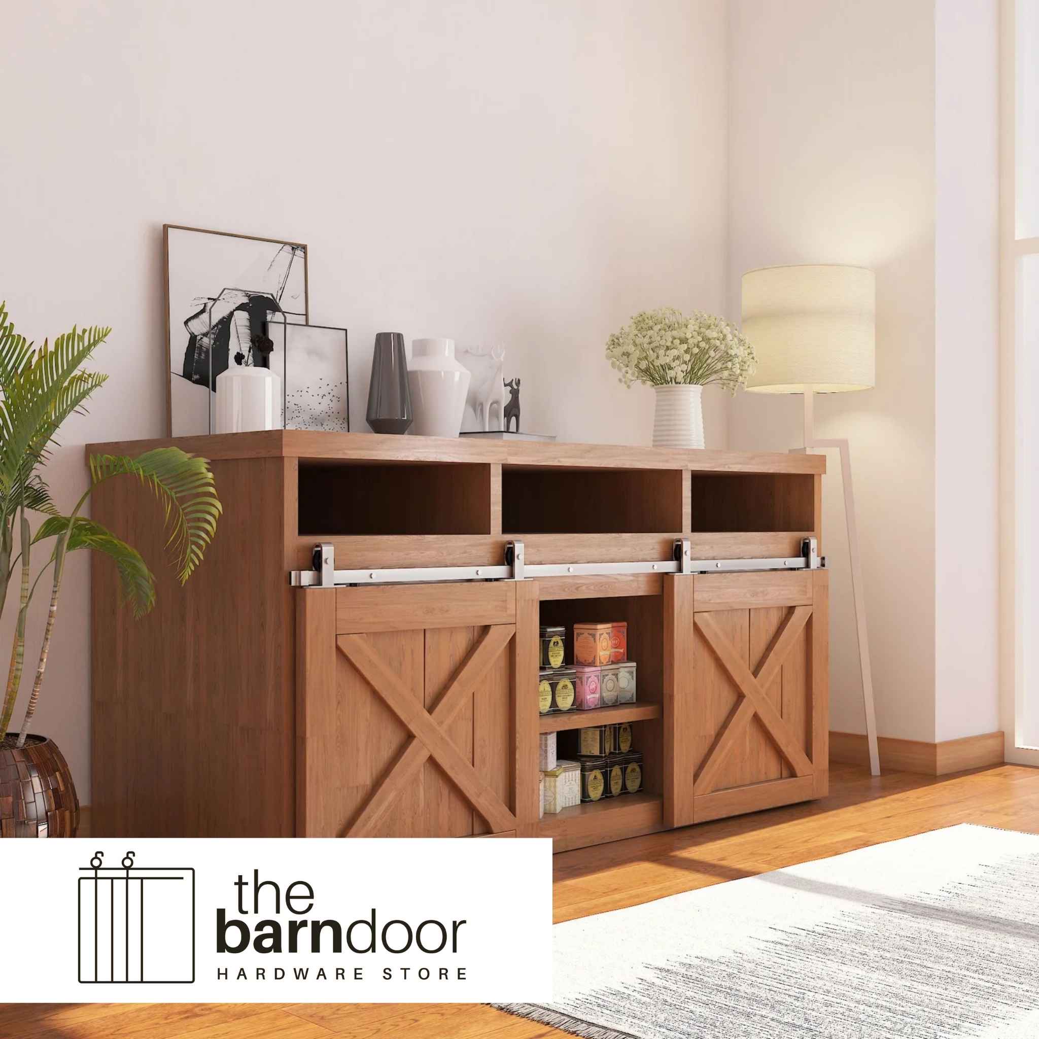 A J Top Mount cabinet barn door hardware kit in a brushed nickel finish, mounted on a small cabinet door.