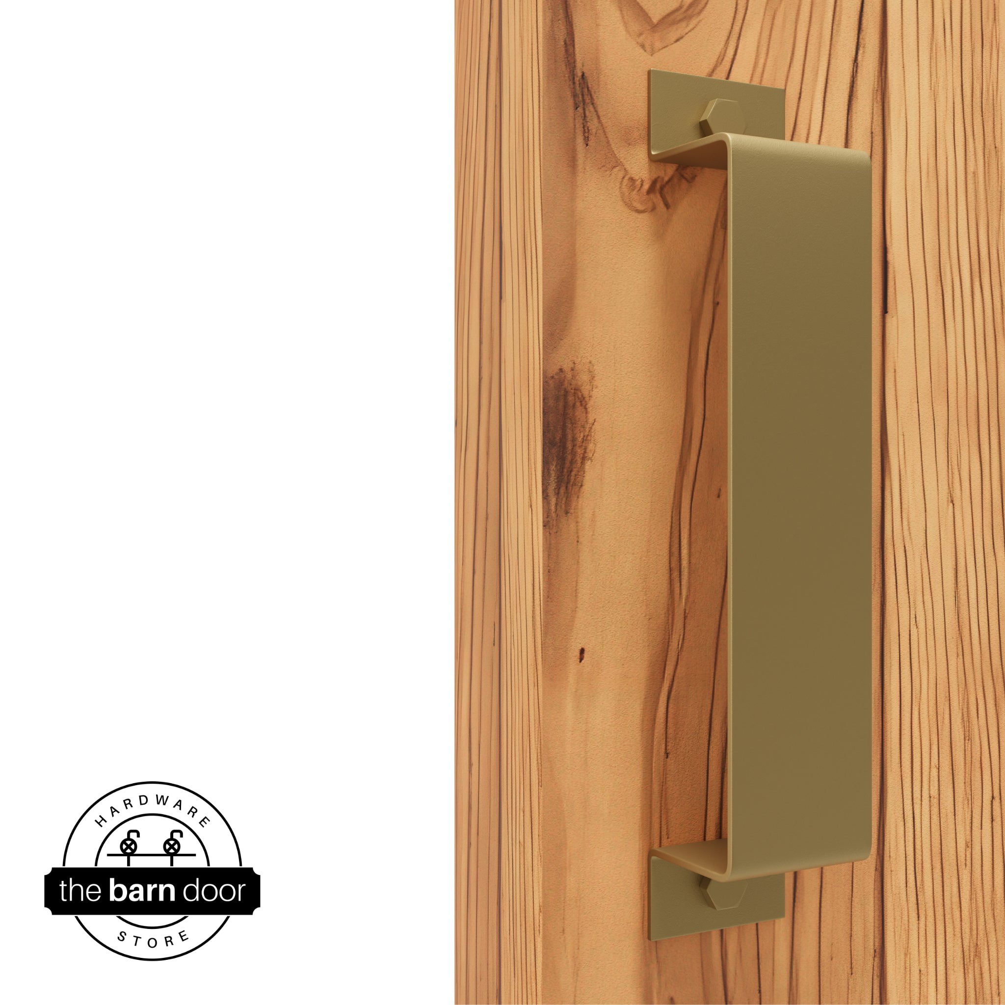 A Jacob's Gold, arch-shaped barn door handle is mounted on a light-colored wooden door with a vertical grain pattern.