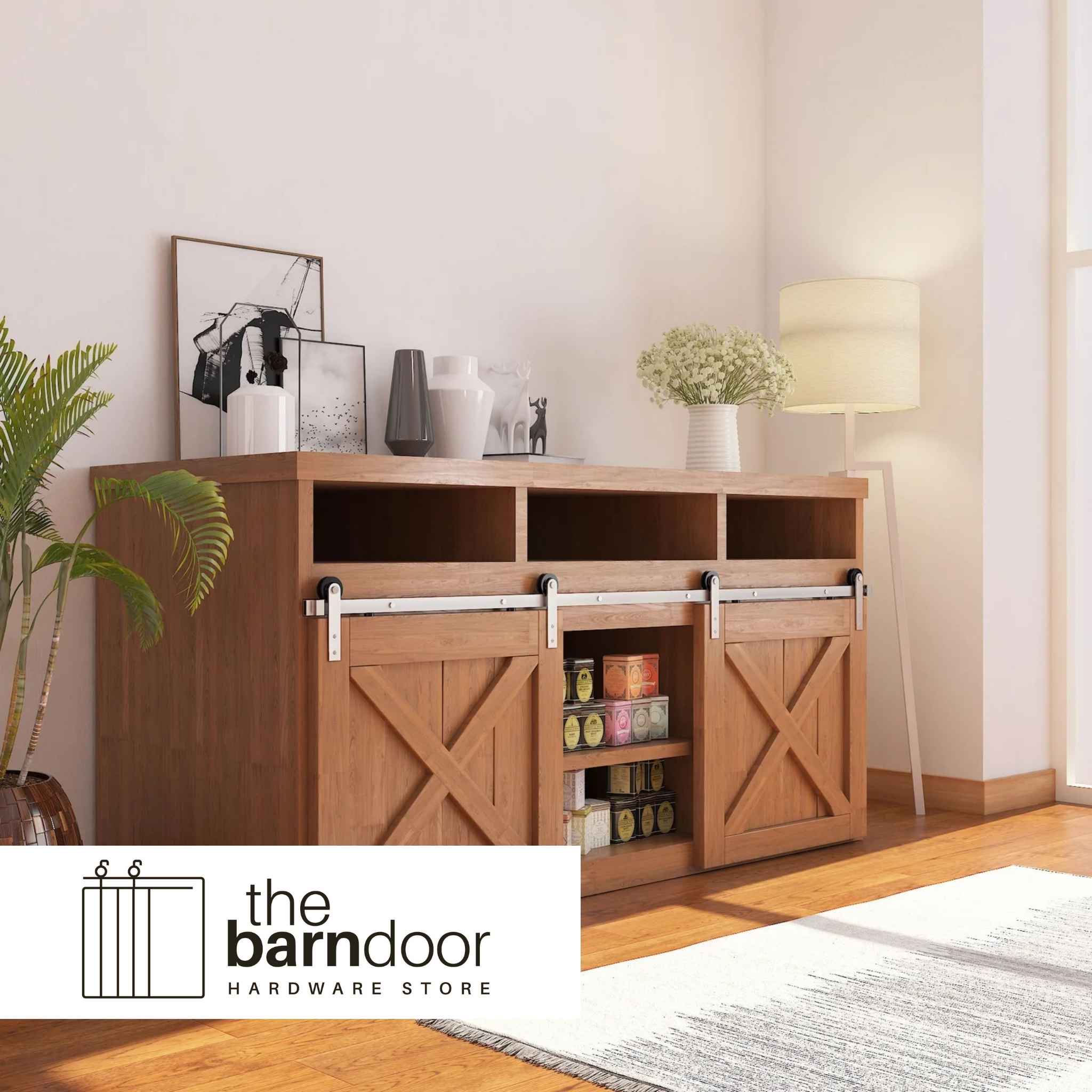 A Straight Strap cabinet barn door hardware kit in a brushed nickel finish, mounted on a small cabinet door.