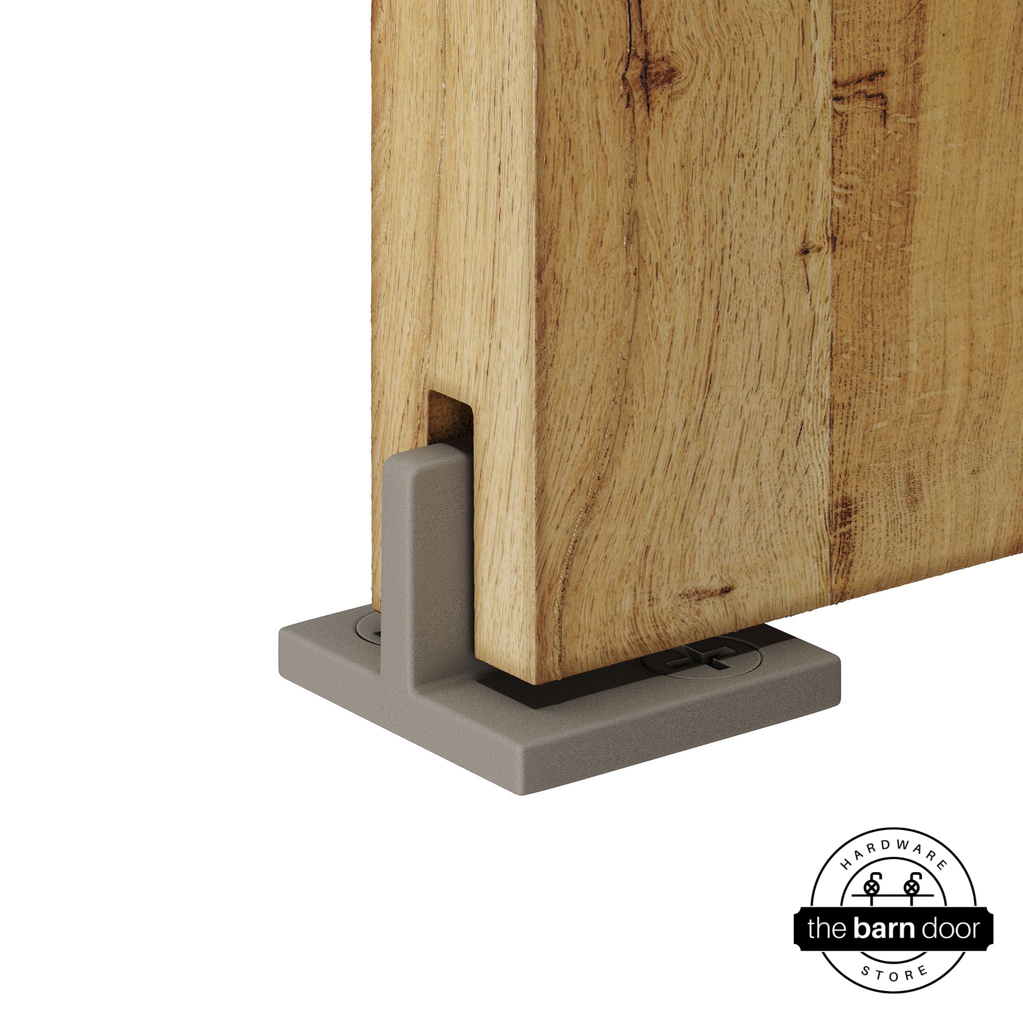 White bronze Goldberg Brothers T-Guide attached to a wooden barn door
