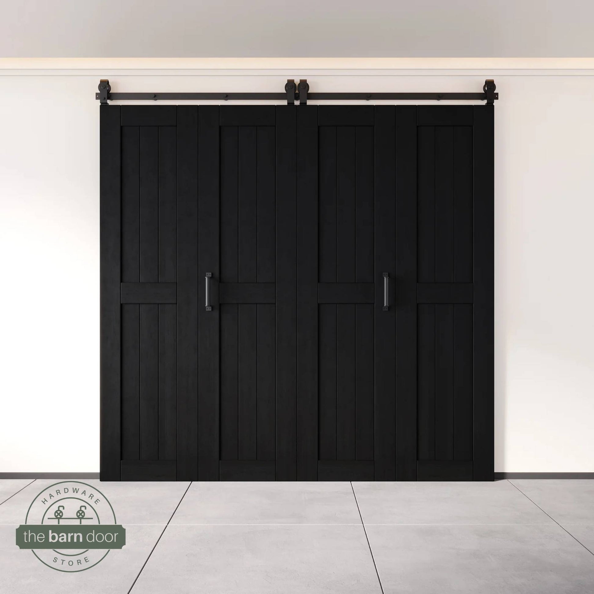 Four-panel bi-parting bifold barn door in a Black finish, fully closed in a modern entryway, showing the top-mount Matte Black track.