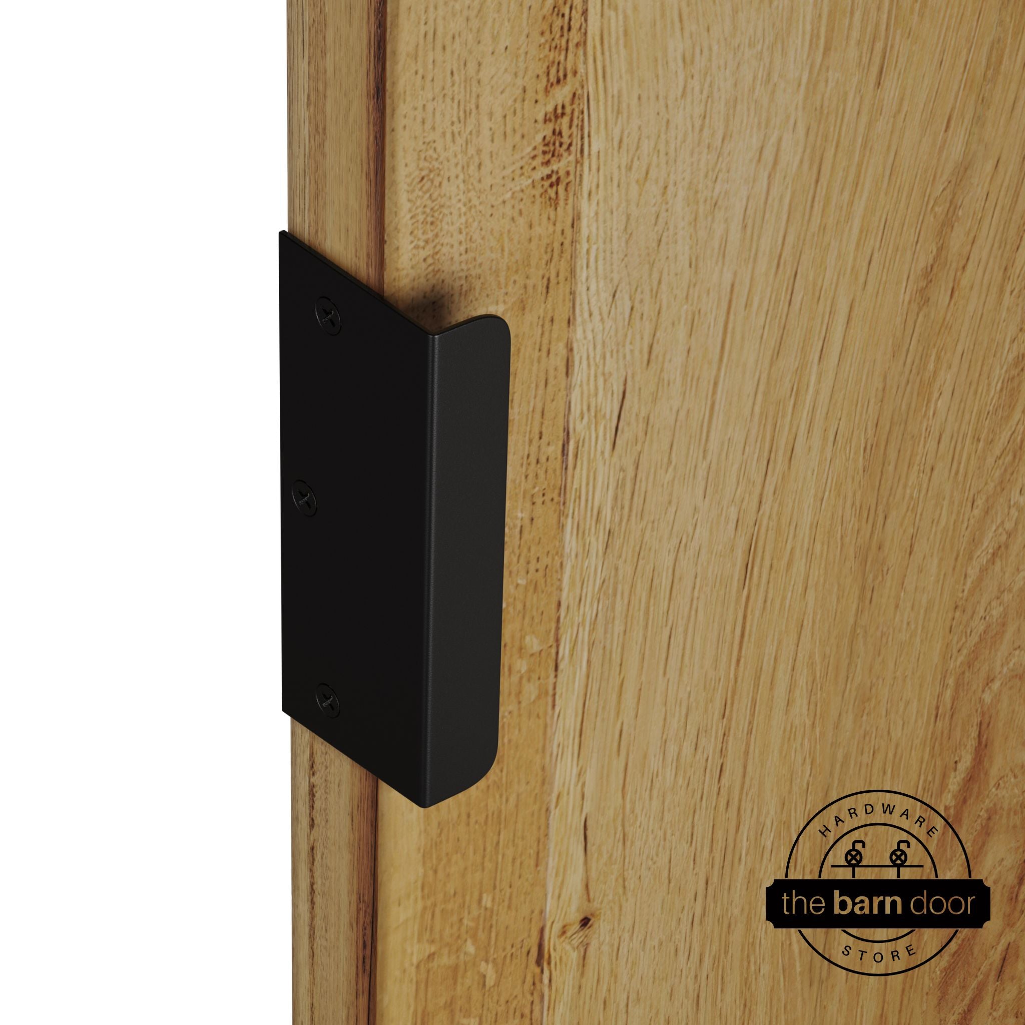 Black sliding barn door edge pull handle on natural wood door edge