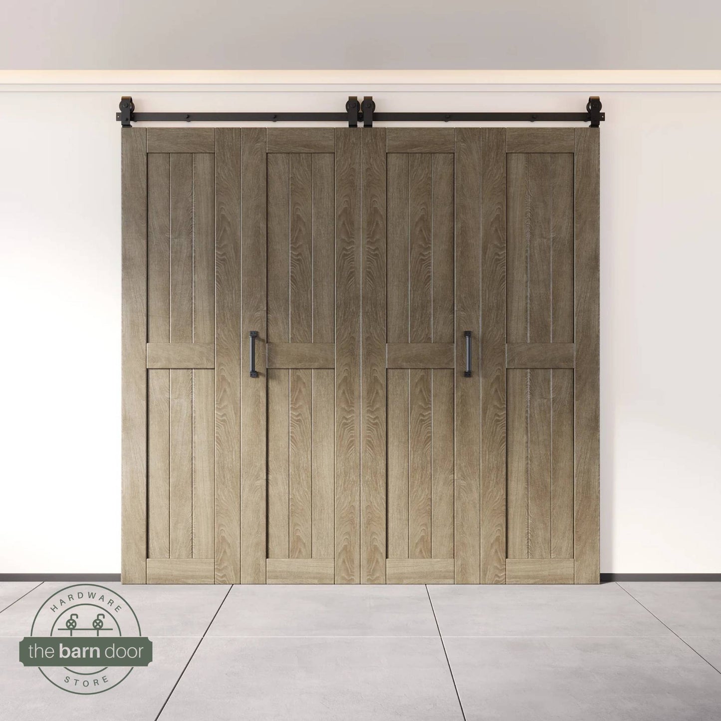 Four-panel bi-parting bifold barn door in a classic gray finish, fully closed in a modern entryway, showing the top-mount Matte Black track.