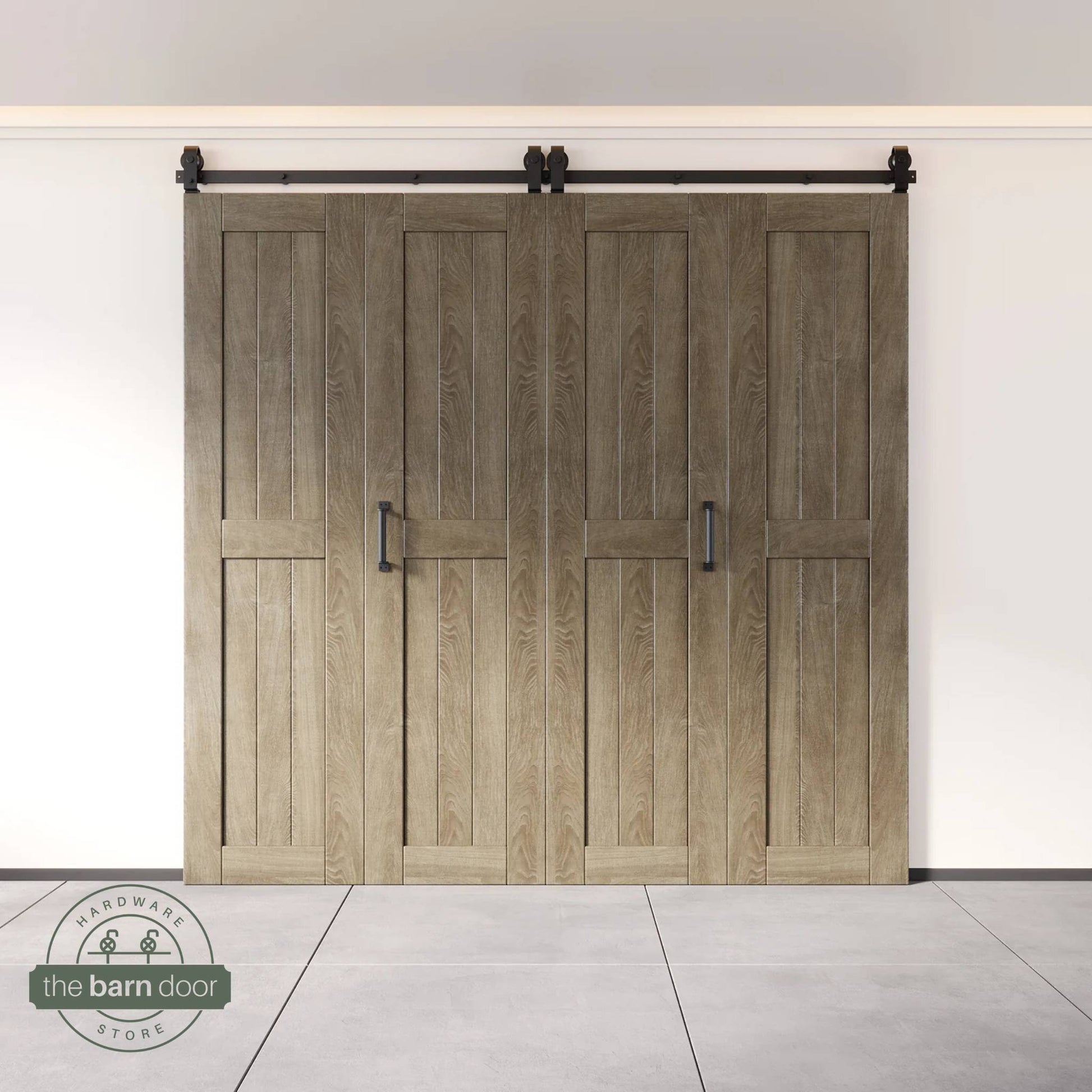 Four-panel bi-parting bifold barn door in a classic gray finish, fully closed in a modern entryway, showing the top-mount Matte Black track.