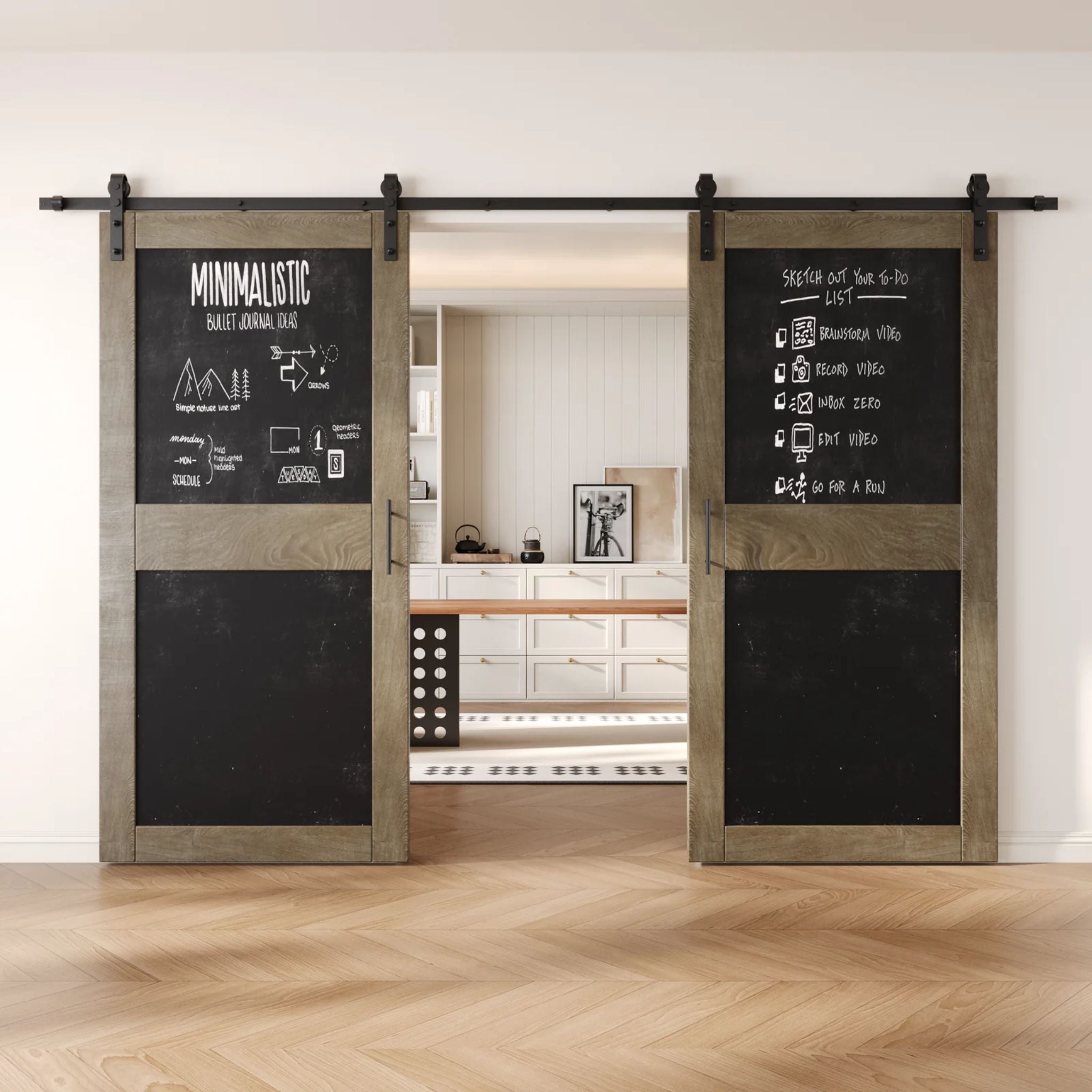 Classic gray barn doors with black chalkboard surfaces in a modern interior setting
