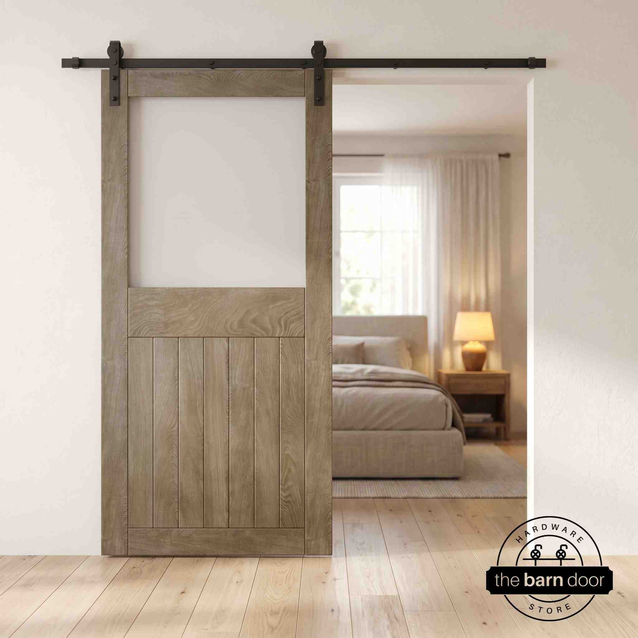 Classic Gray sliding half-lite frosted glass barn door in a modern interior setting with a desk and shelves.