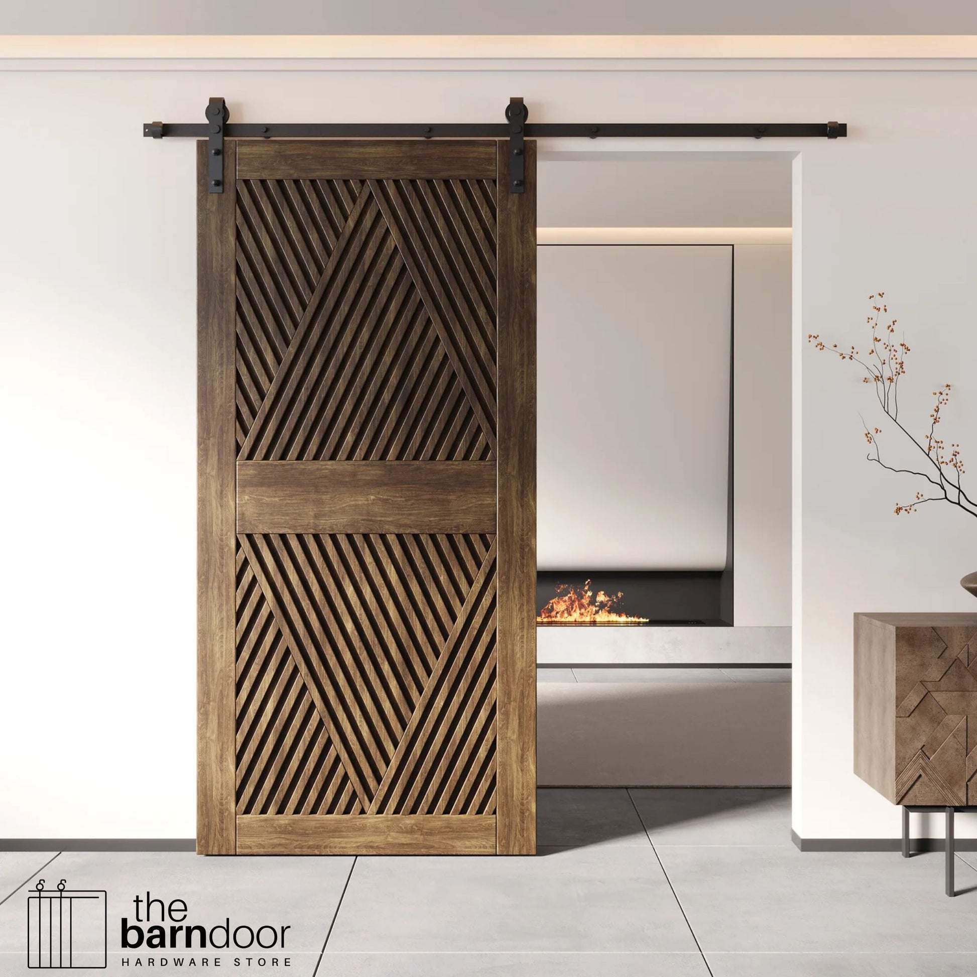 A modern dark walnut barn door with an intricate geometric diamond pattern installed on a black track in a contemporary living space with a fireplace.