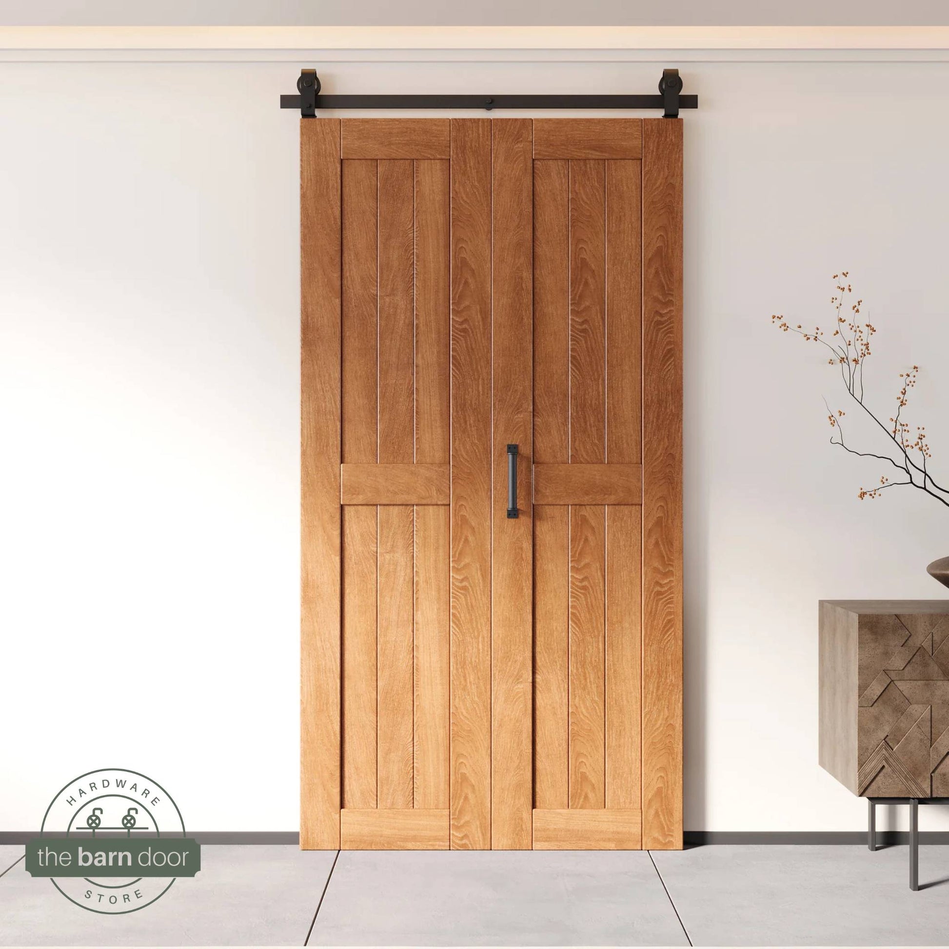 Two-panel bifold barn door in Early American finish, installed and fully closed in a modern interior, showing the top-mount Matte Black track.