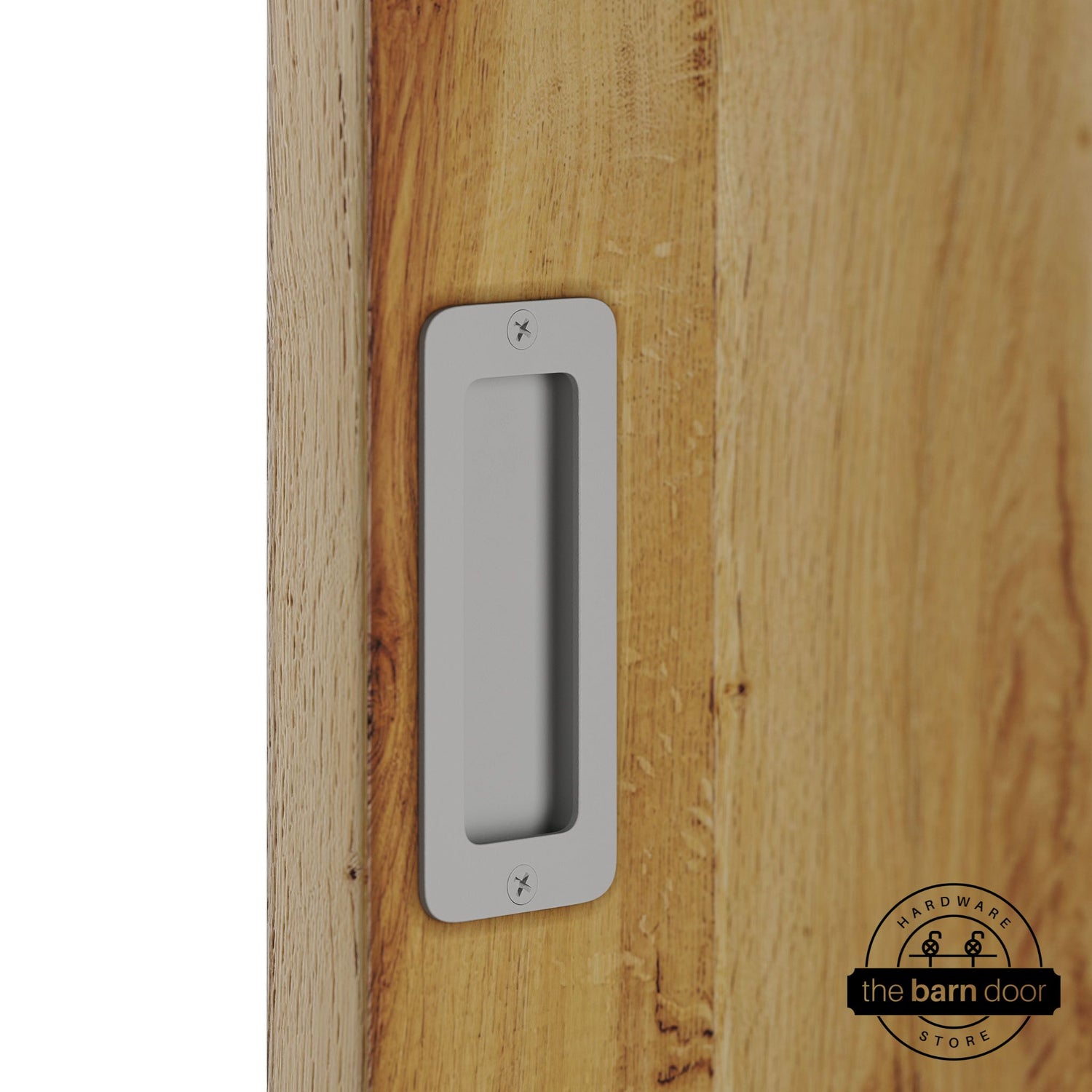 Flint gray partial radius flush pull handle for sliding barn doors, installed on natural wood door panel