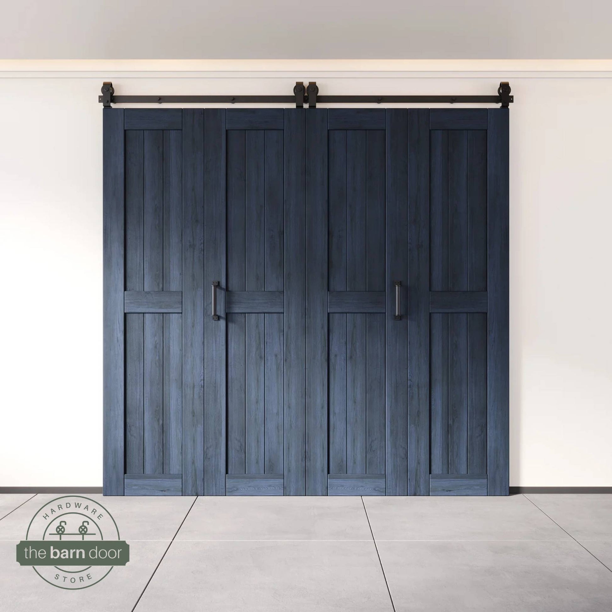 Four-panel bi-parting bifold barn door in a navy finish, fully closed in a modern entryway, showing the top-mount Matte Black track.