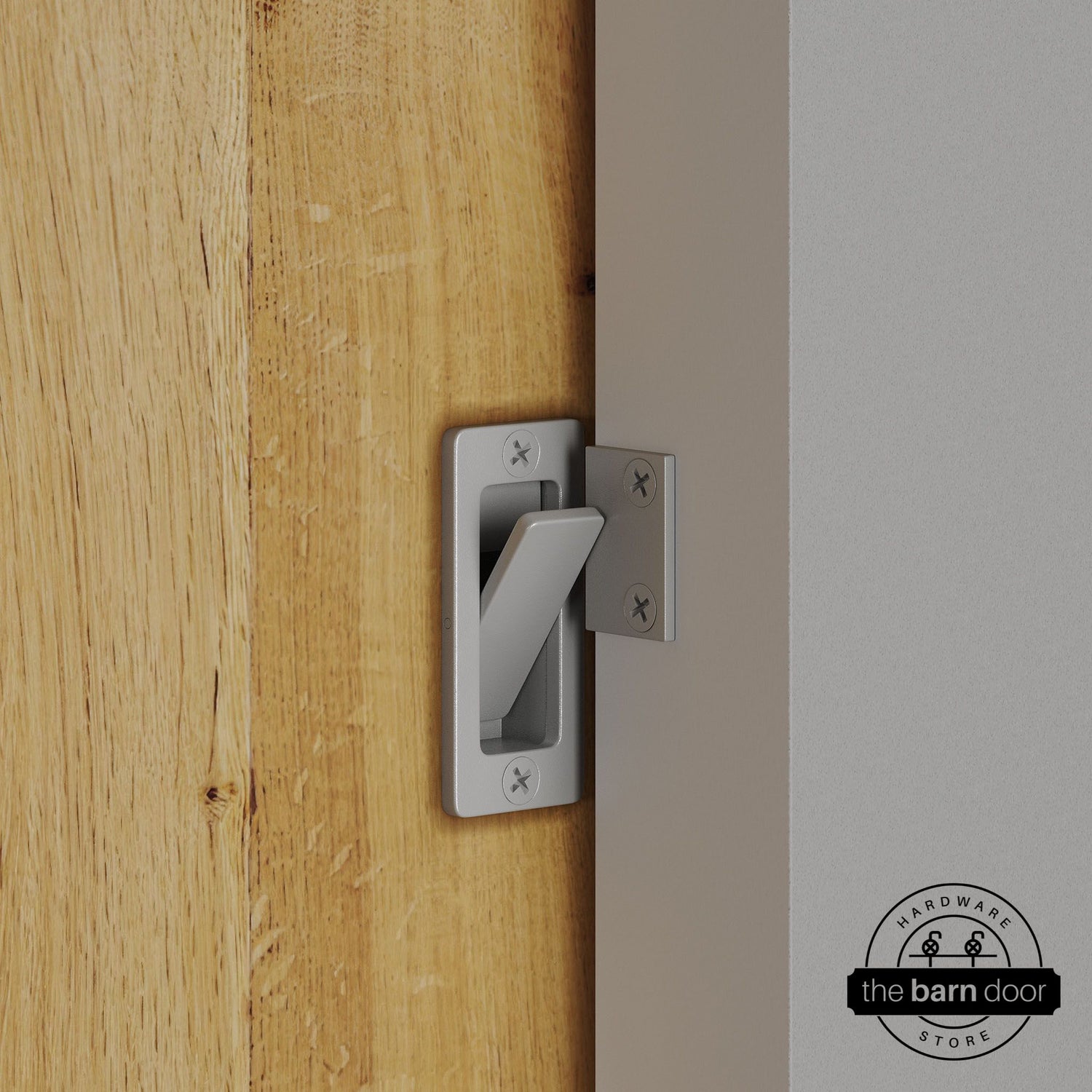 PC Chrome privacy latch installed on a sliding barn door, shown in the locked position against door frame