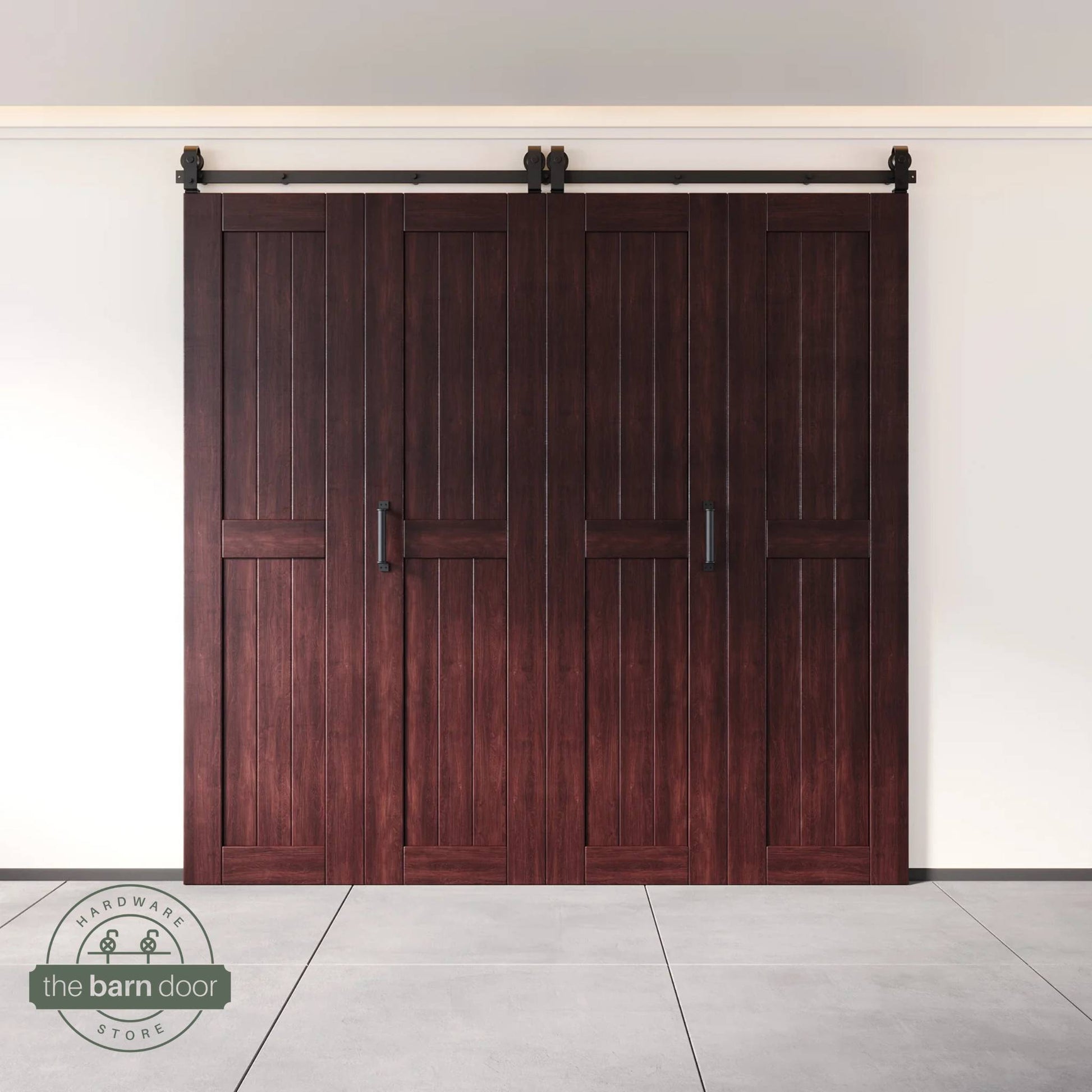 Four-panel bi-parting bifold barn door in a red mahogany finish, fully closed in a modern entryway, showing the top-mount Matte Black track.