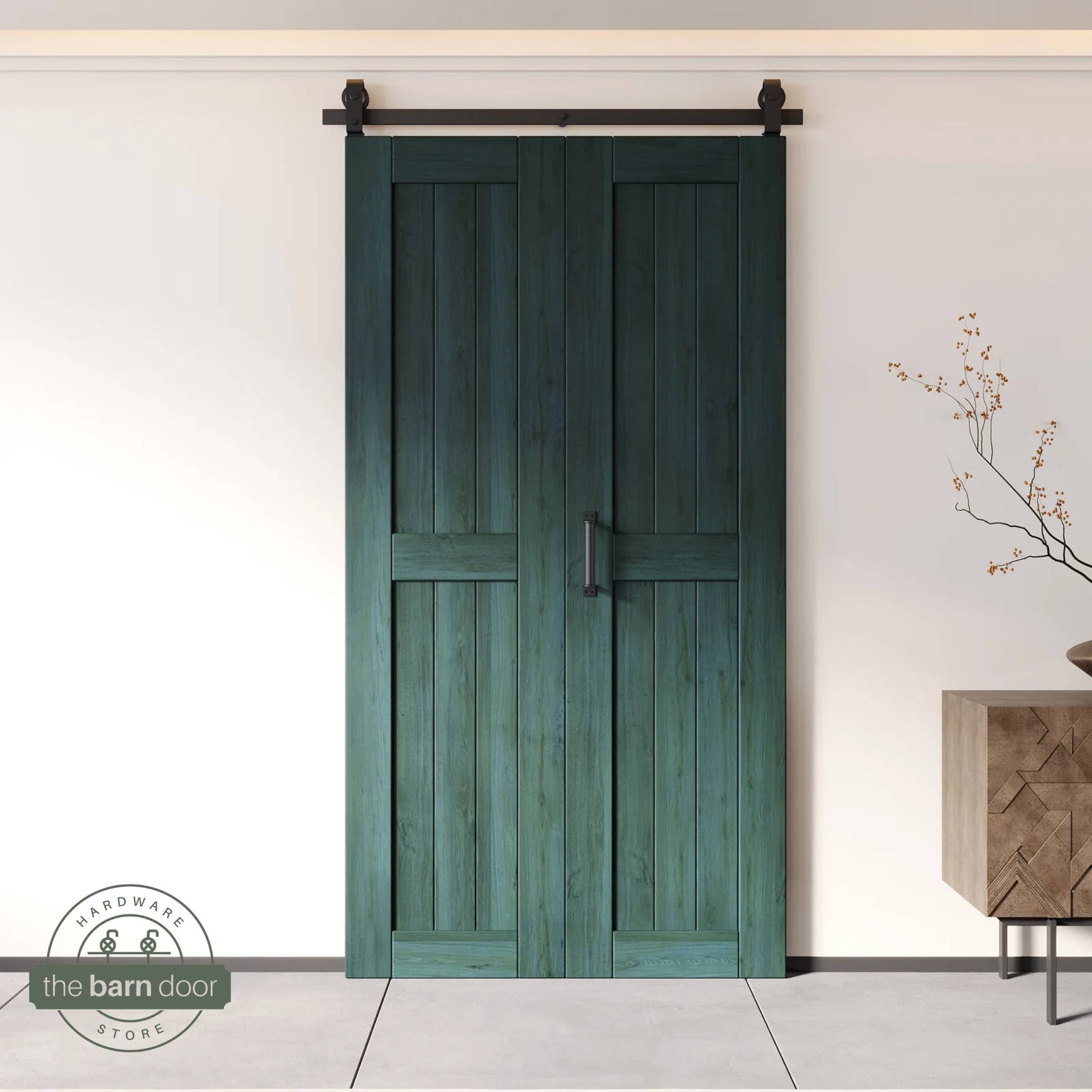 Two-panel bifold barn door in Royal Pine finish, installed and fully closed in a modern interior, showing the top-mount Matte Black track.