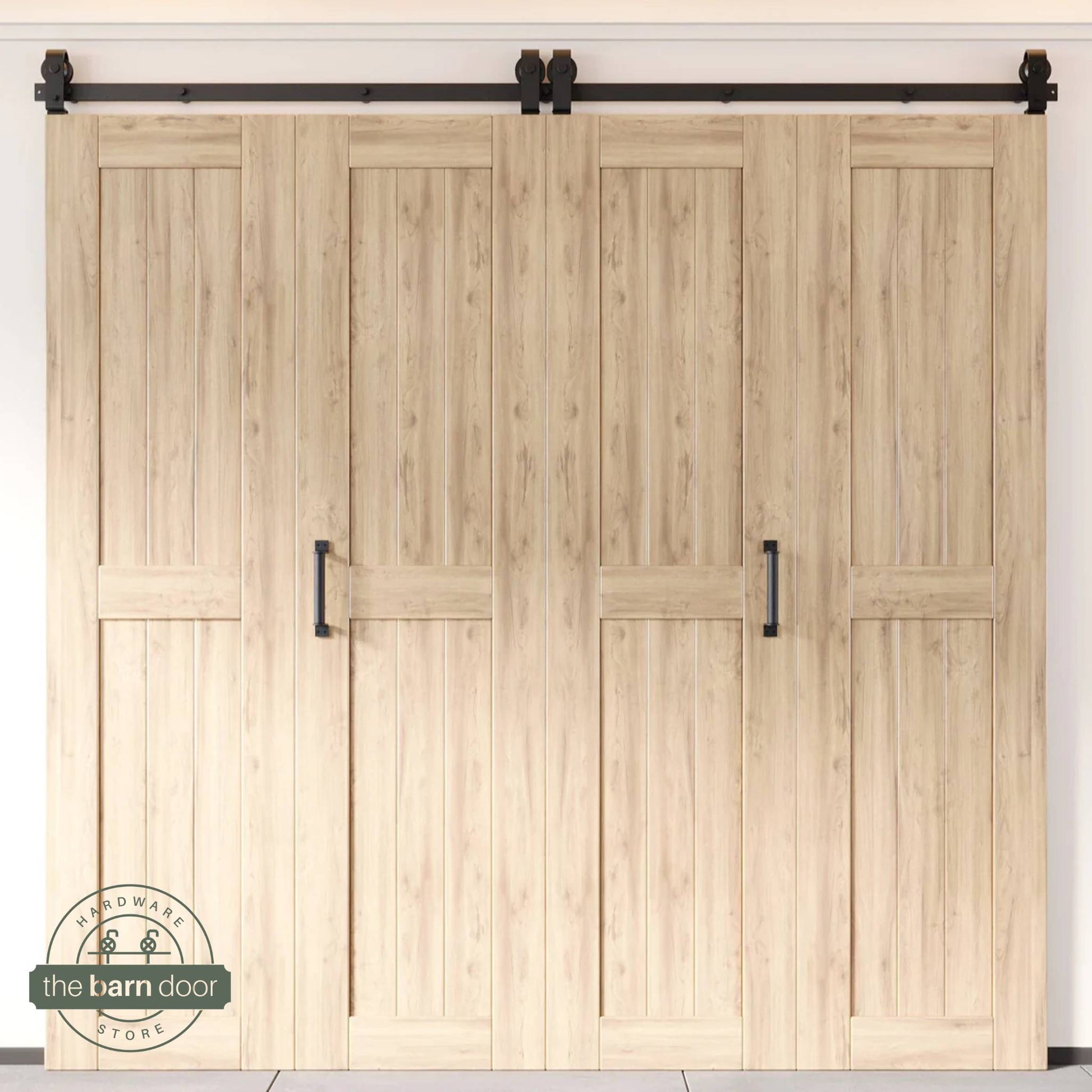 Four-panel bi-parting unfinished bifold barn door, fully closed in a modern entryway, showing the top-mount Matte Black track.