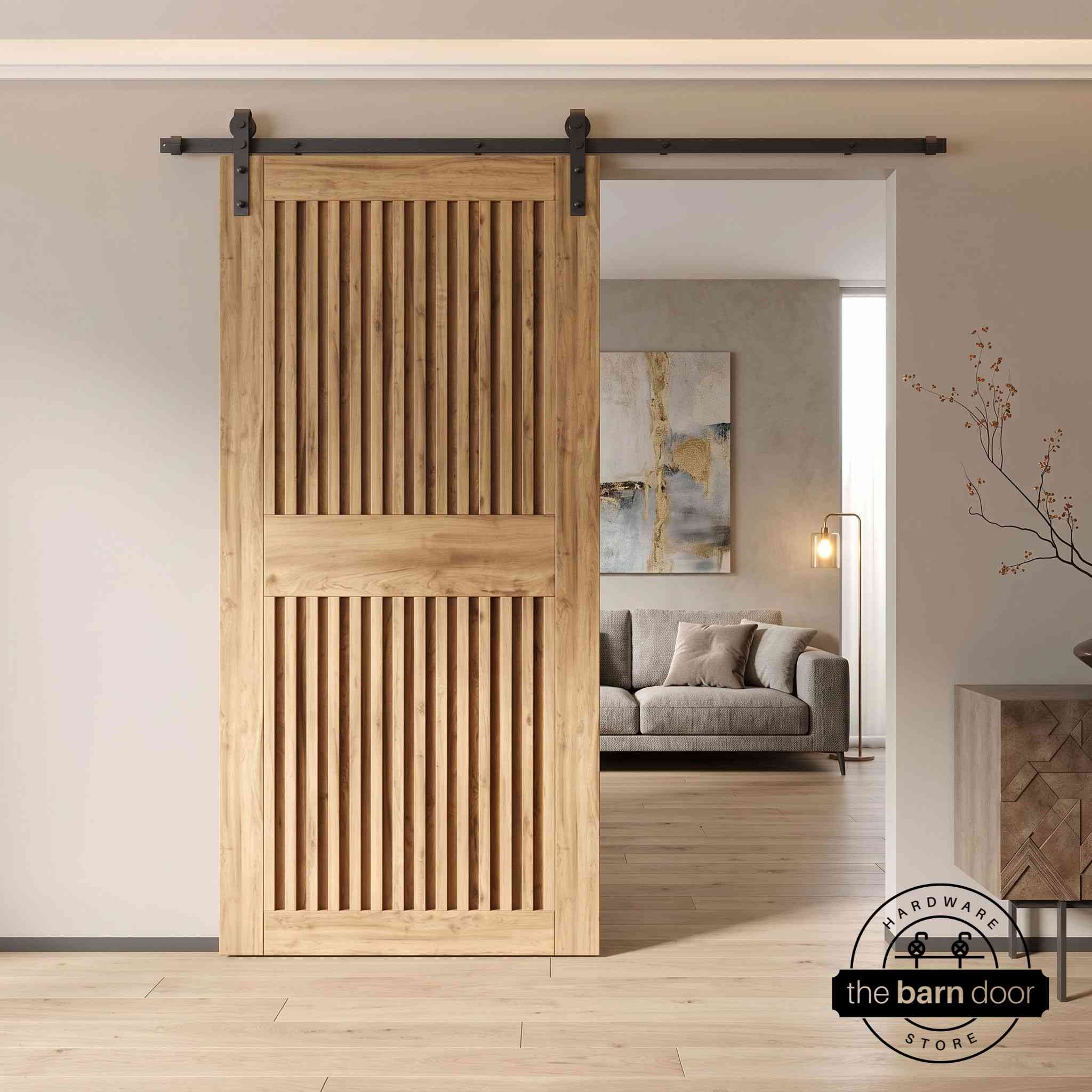 Unfinished wooden sliding door in a modern interior setting with a fireplace and decorative elements.