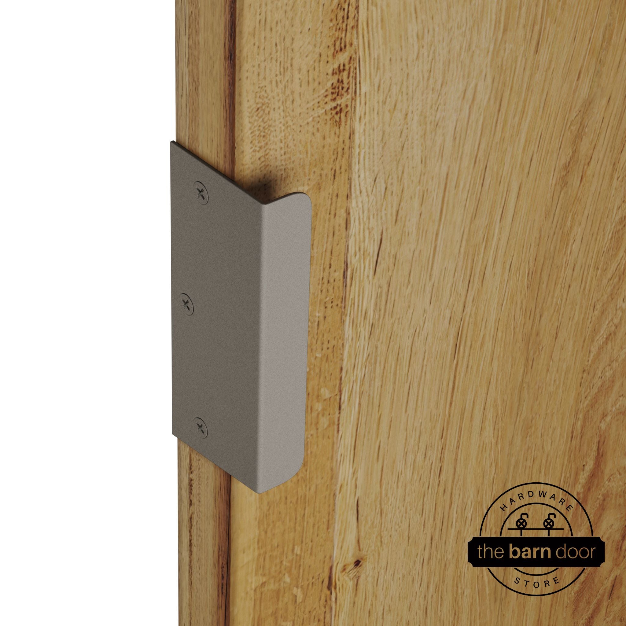 White bronze sliding barn door edge pull handle on natural wood door edge