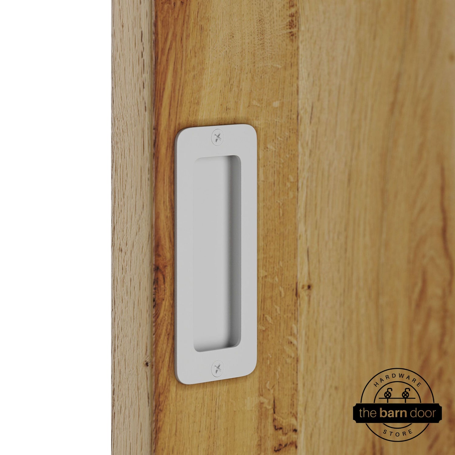 White partial radius flush pull handle for sliding barn doors, installed on natural wood door panel