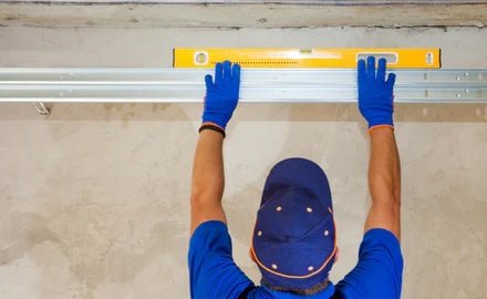 Contractor Leveling Barn Door Track