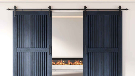 Two navy blue barn doors with J-Strap barn door rollers and black barn door hardware.