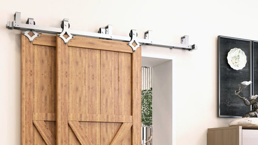 Two rustic wood barn doors with X-braces on a modern brushed nickel sliding track, next to a partial doorway and a decorative dark wall.