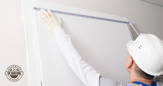 Contractor Measuring Barn Door