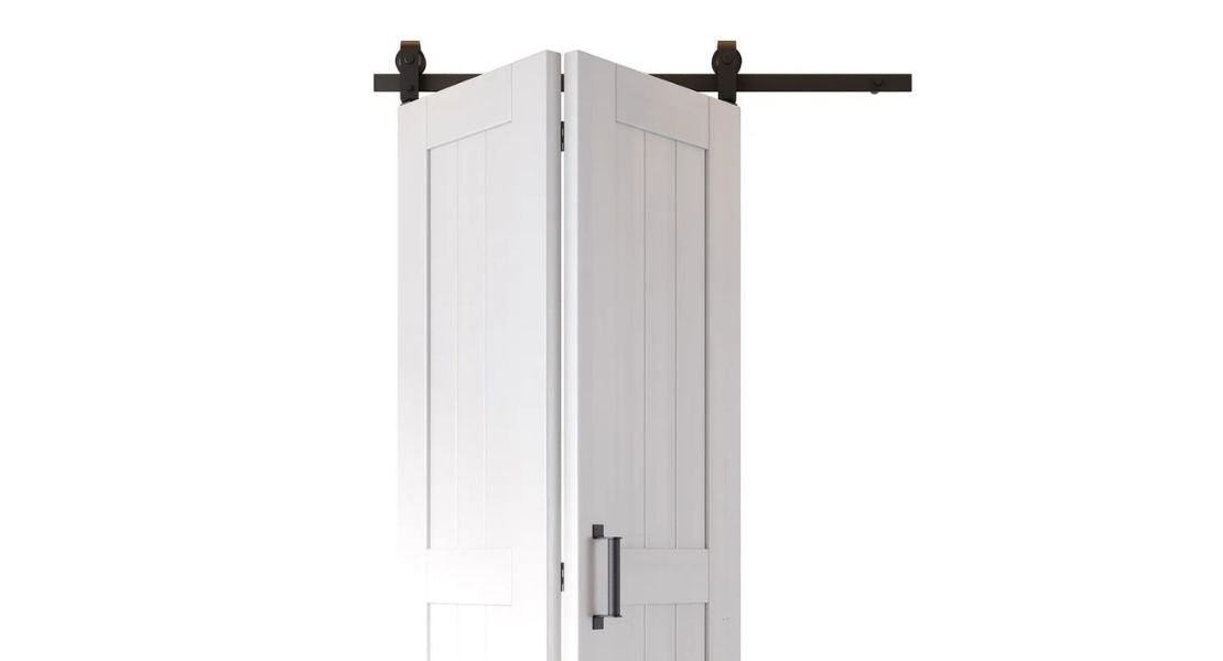 Bifold barn door hardware with a white bifold barn door and handle on a white background.