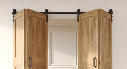 Light oak wood bifold barn doors with matte black hardware.