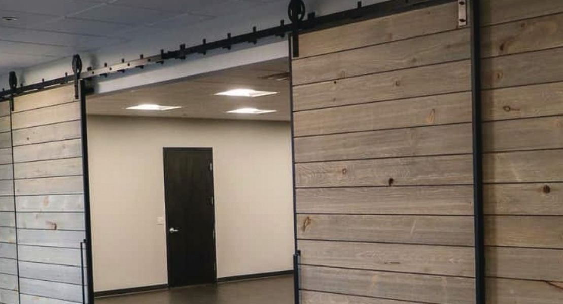 Barn doors created with Goldberg Brothers barn door edge wraps
