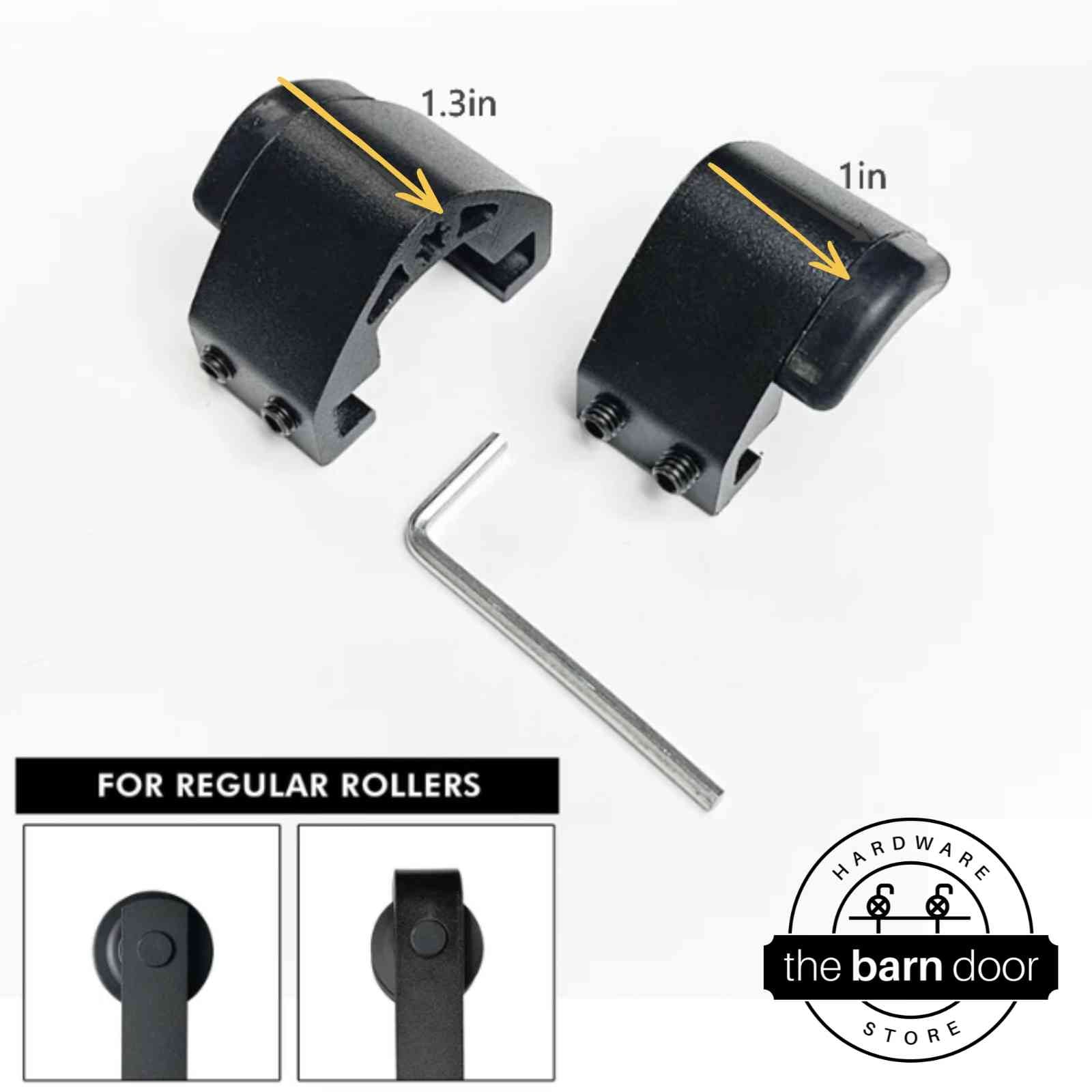 Adjustable barn door track stop set in matte black with two clamps, rubber bumpers, and an allen wrench shown with size callouts, for regular rollers. By The Barn Door Hardware Store.