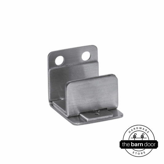 All-in-one wall mounted stainless steel barn door floor guide from Goldberg Brothers.