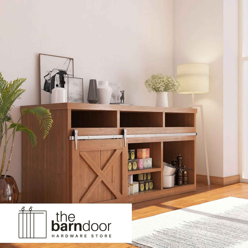 Arrow cabinet barn door hardware kit in a brushed nickel finish, mounted on a small cabinet door.