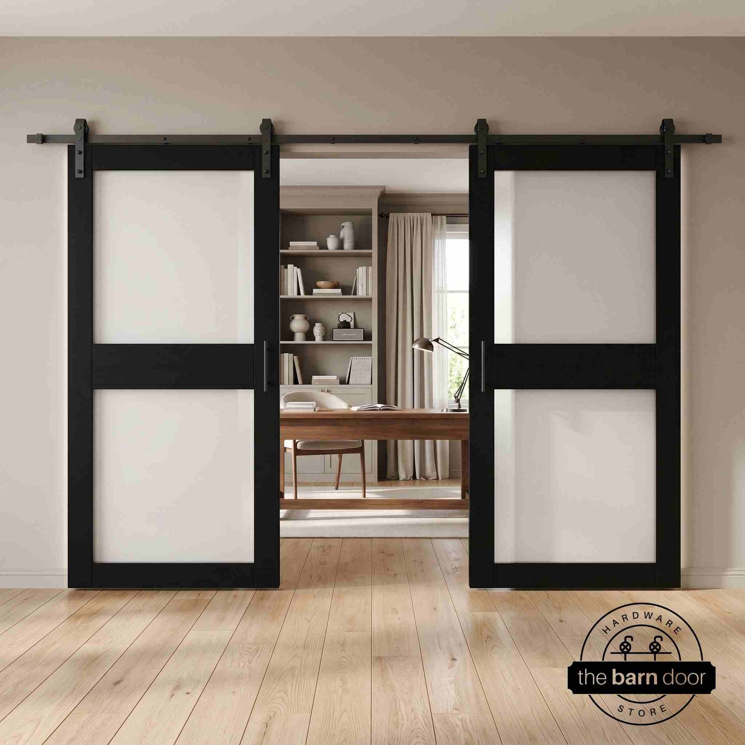 Black wooden sliding glass panel barn doors with black hardware in a modern interior setting.
