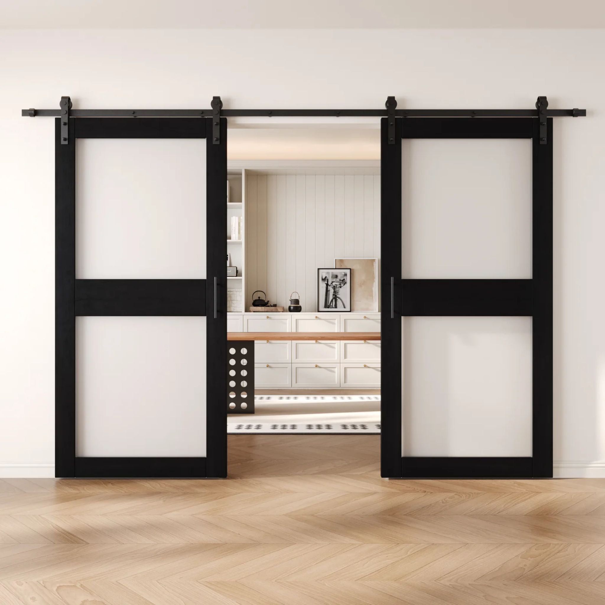 Black wooden sliding glass panel barn doors with black hardware in a modern interior setting.