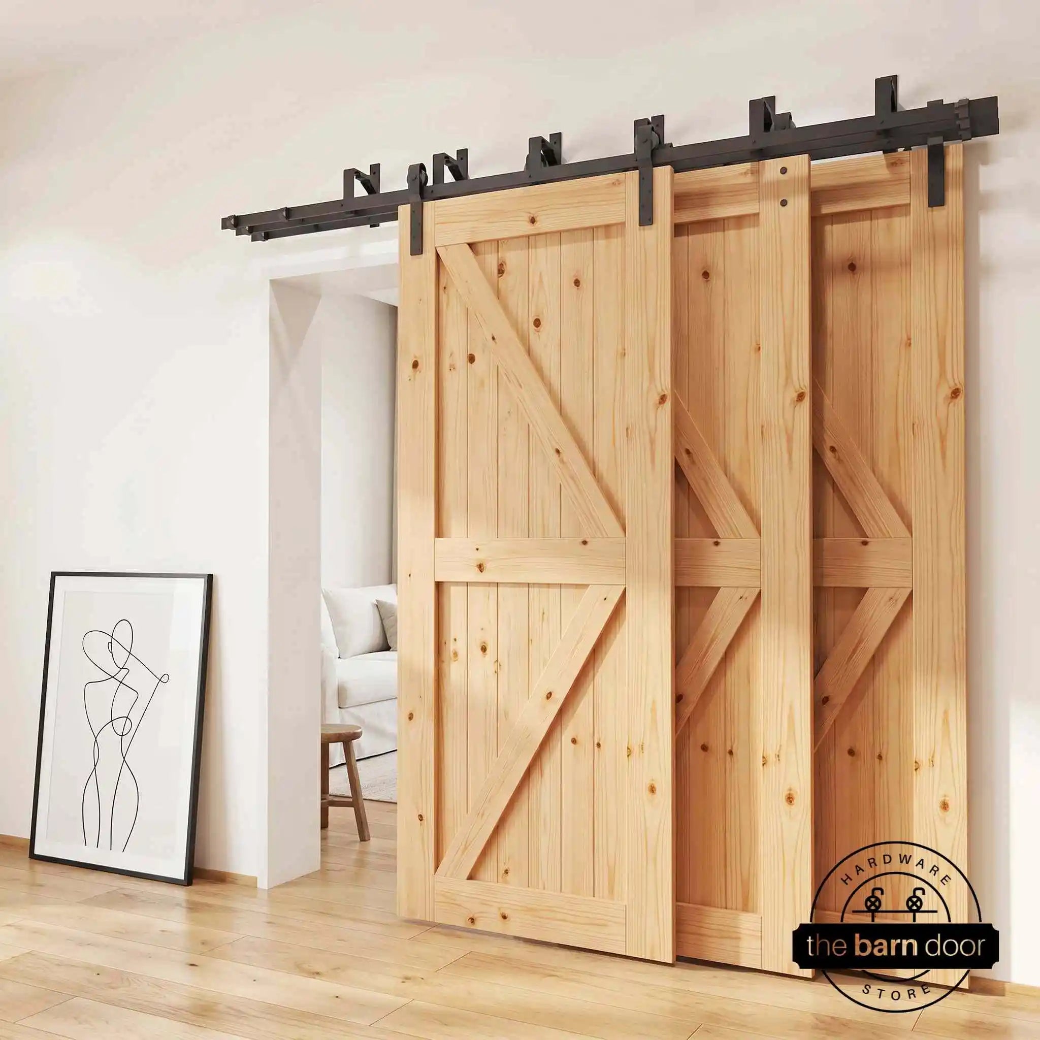 J-Strap Triple Track Bypass Barn Door Hardware Kit in matte black, showing three barn doors on a multi-track system.
