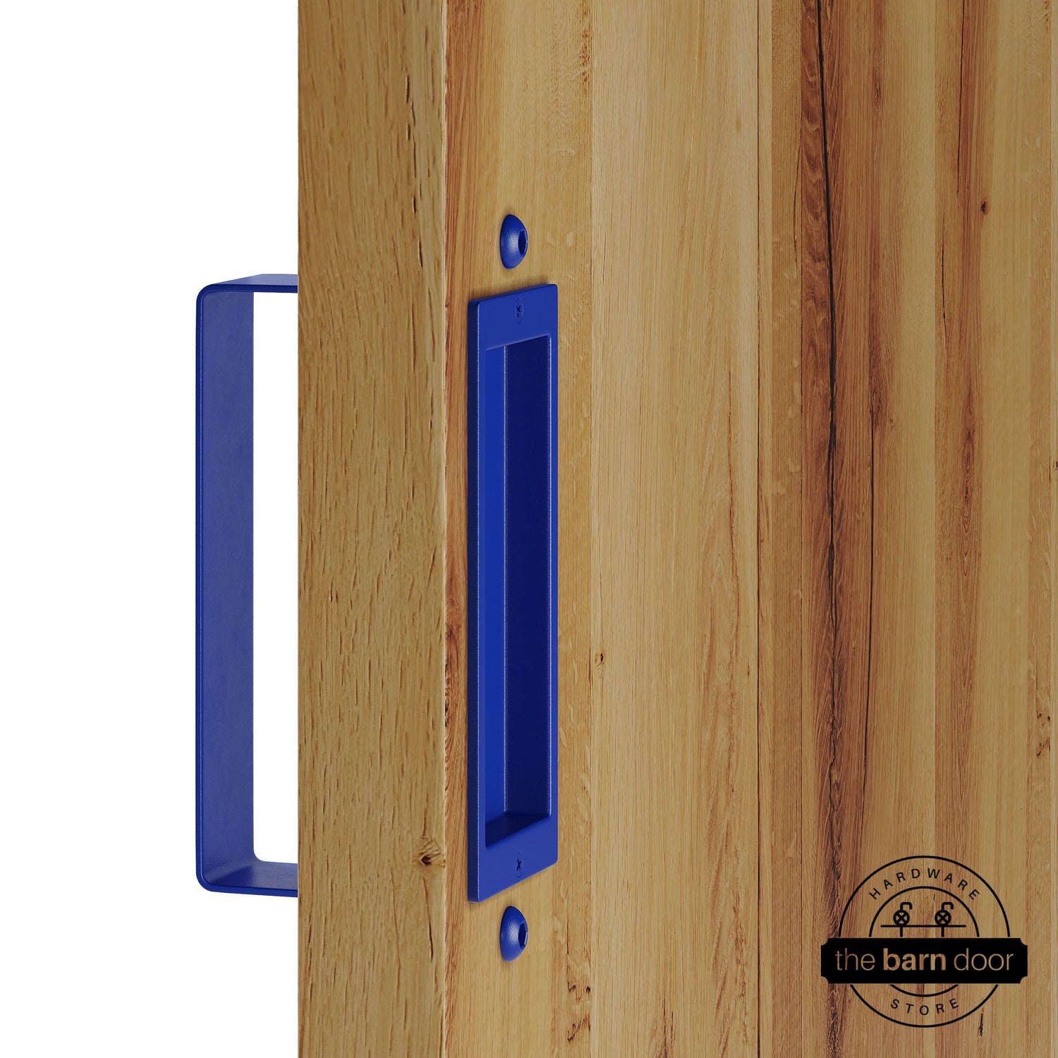 Blue barn door pull handle set installed on a natural wood sliding door, featuring a rectangular U-shaped pull handle on the front face and a flush recessed pull plate on the reverse side, shown in a blue finish.