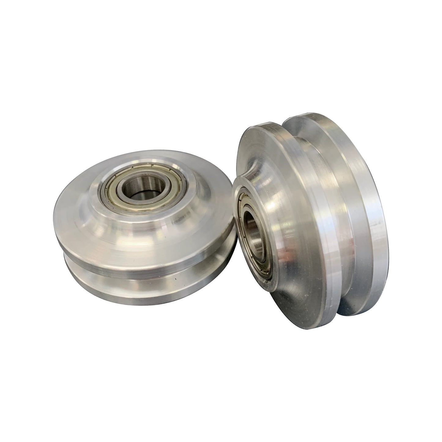 Set of two brushed nickel metal wheel rollers for barn door hardware.