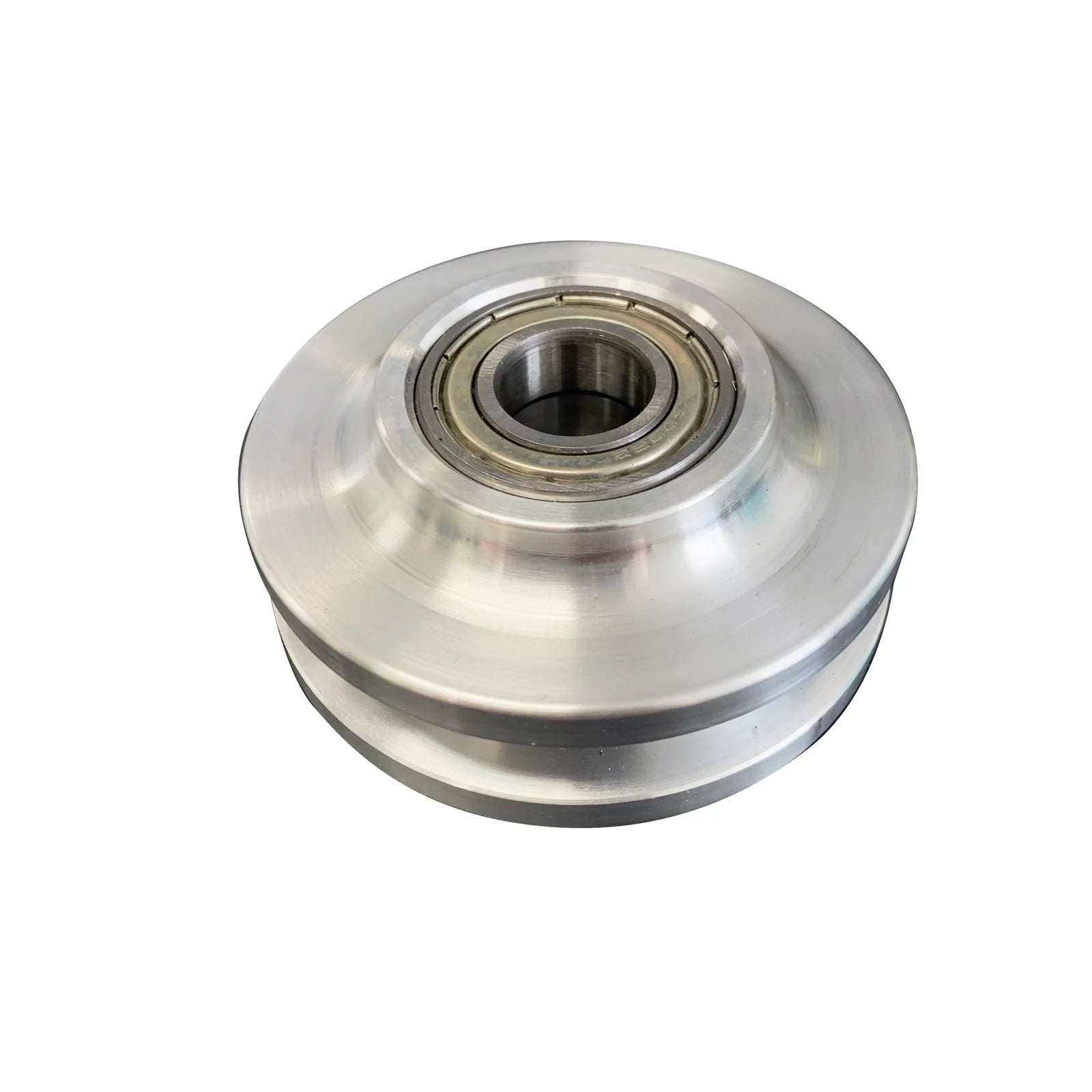 Brushed nickel metal wheel rollers for barn door hardware top view.