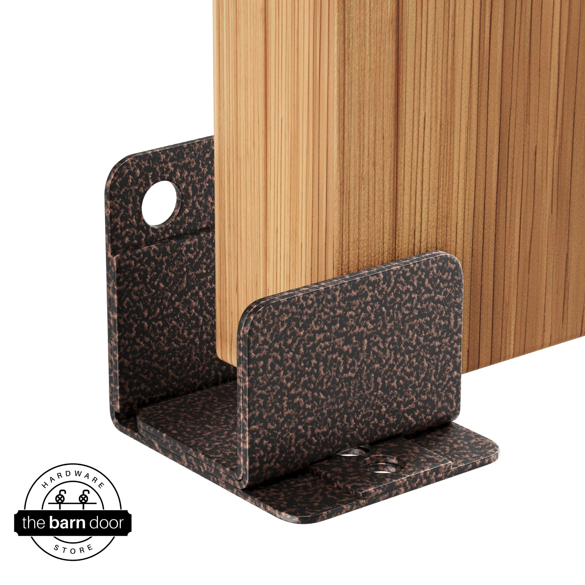 A copper vein U-shaped floor guide with a side plate, holding a light wood barn door in place.