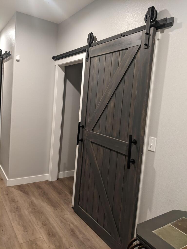Finished Spoke Wheel Barn Door Hardware Install