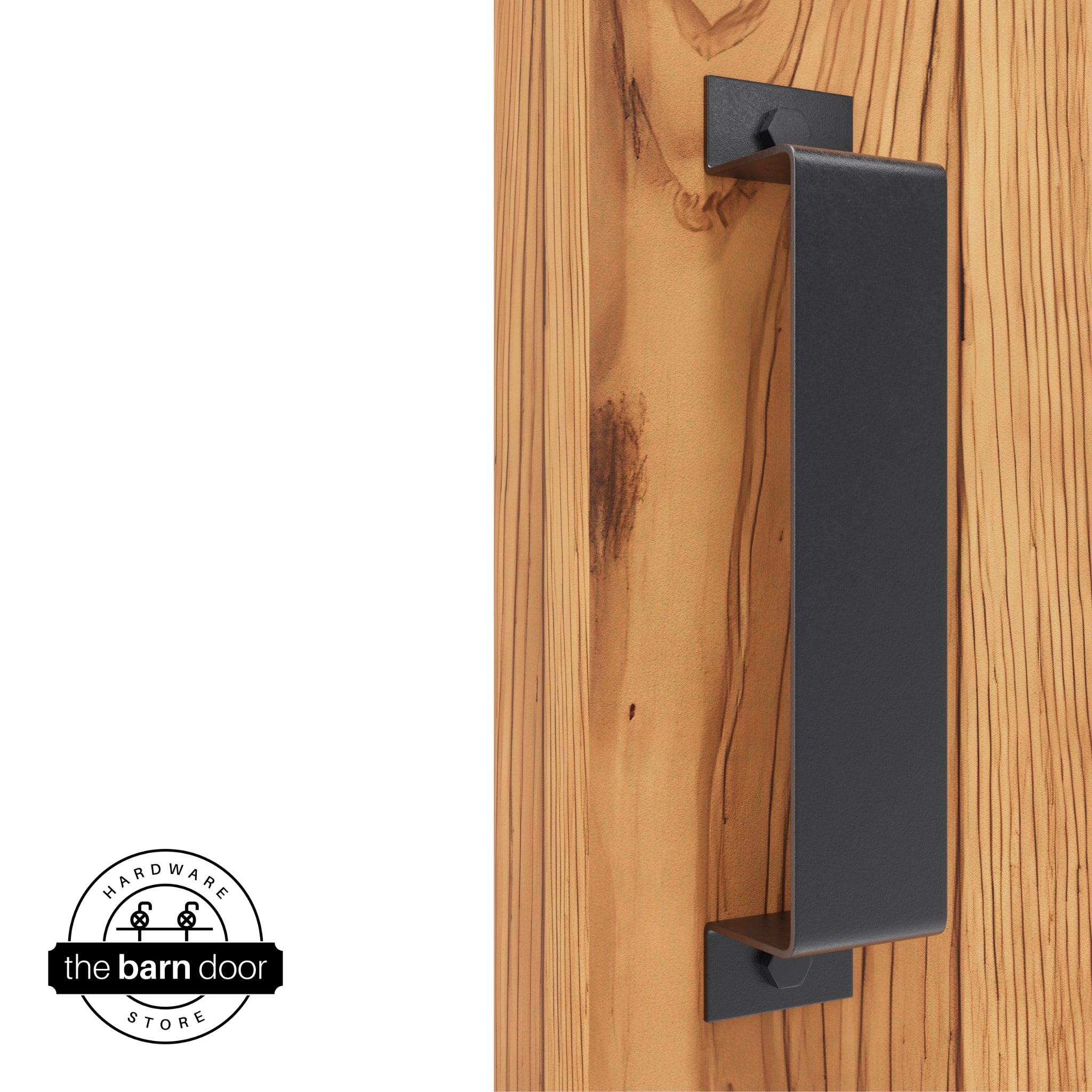 A dark gray, arch-shaped barn door handle is mounted on a light-colored wooden door with a vertical grain pattern.