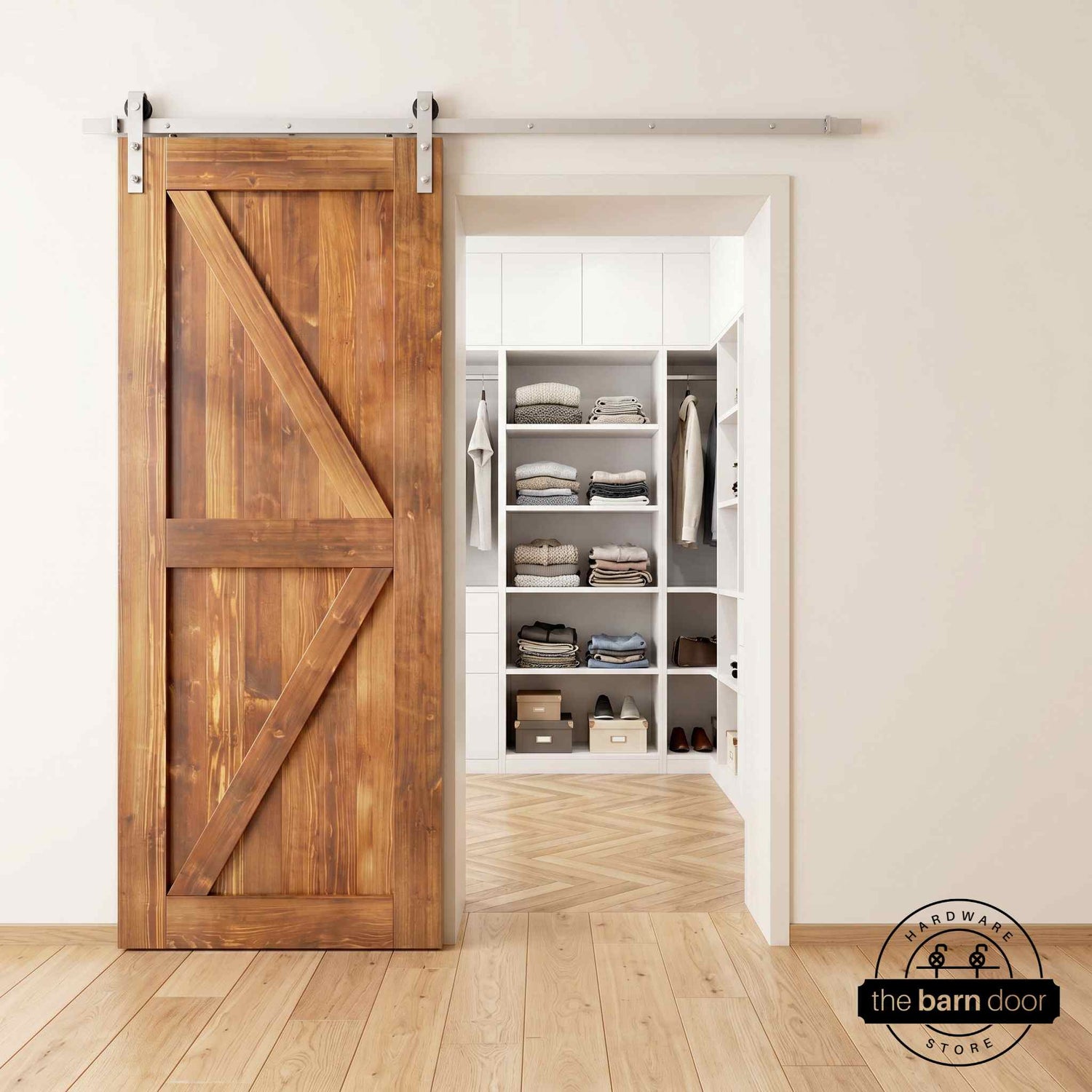 Brushed nickel barn door hardware kit on a Early American K-brace barn door, modern farmhouse style.