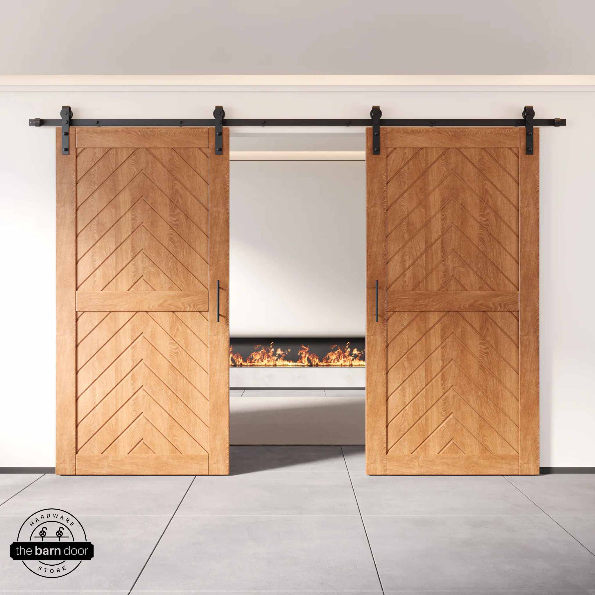Early American wooden barn doors with a chevron pattern on a white wall background