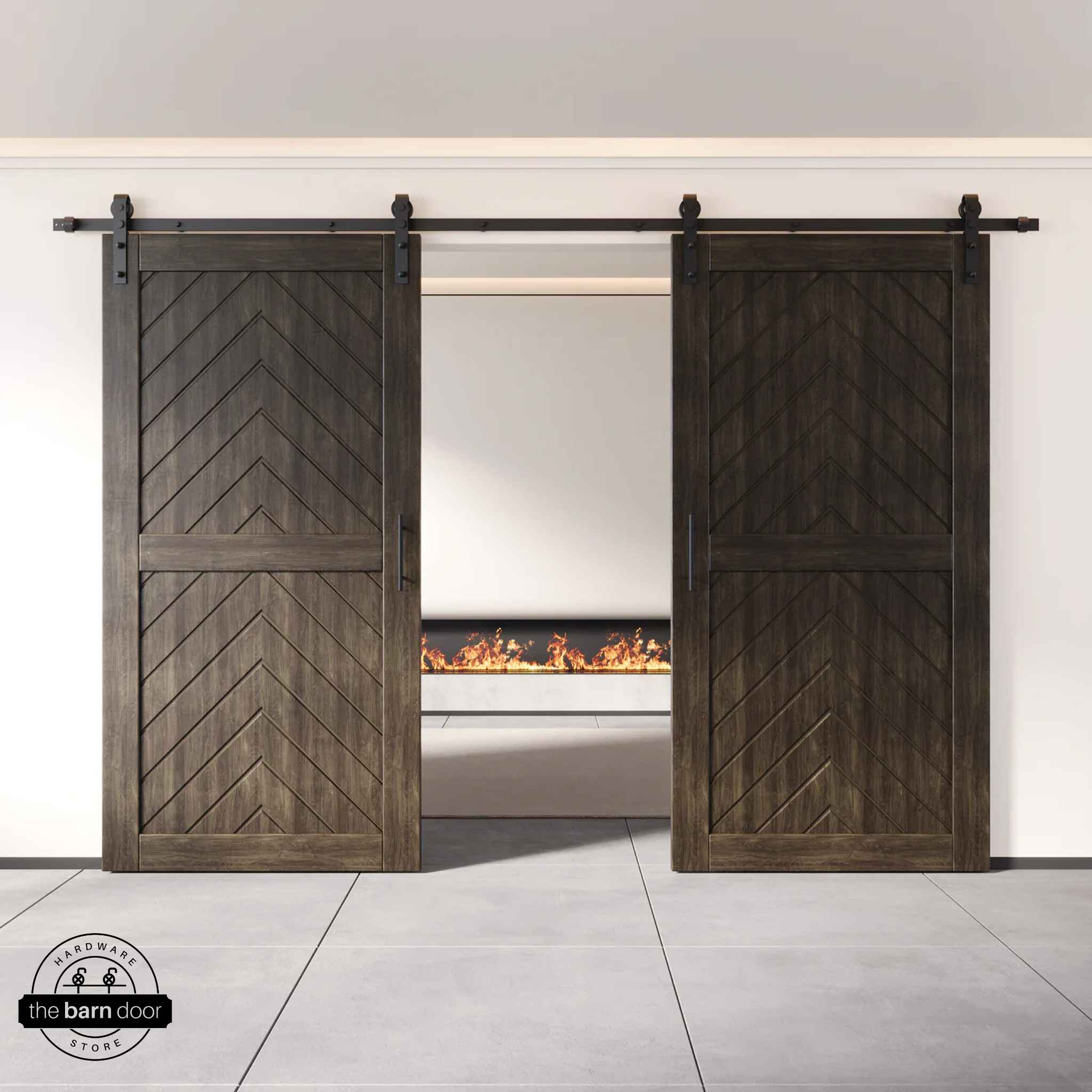 Ebony wooden barn doors with a chevron pattern on a white wall background