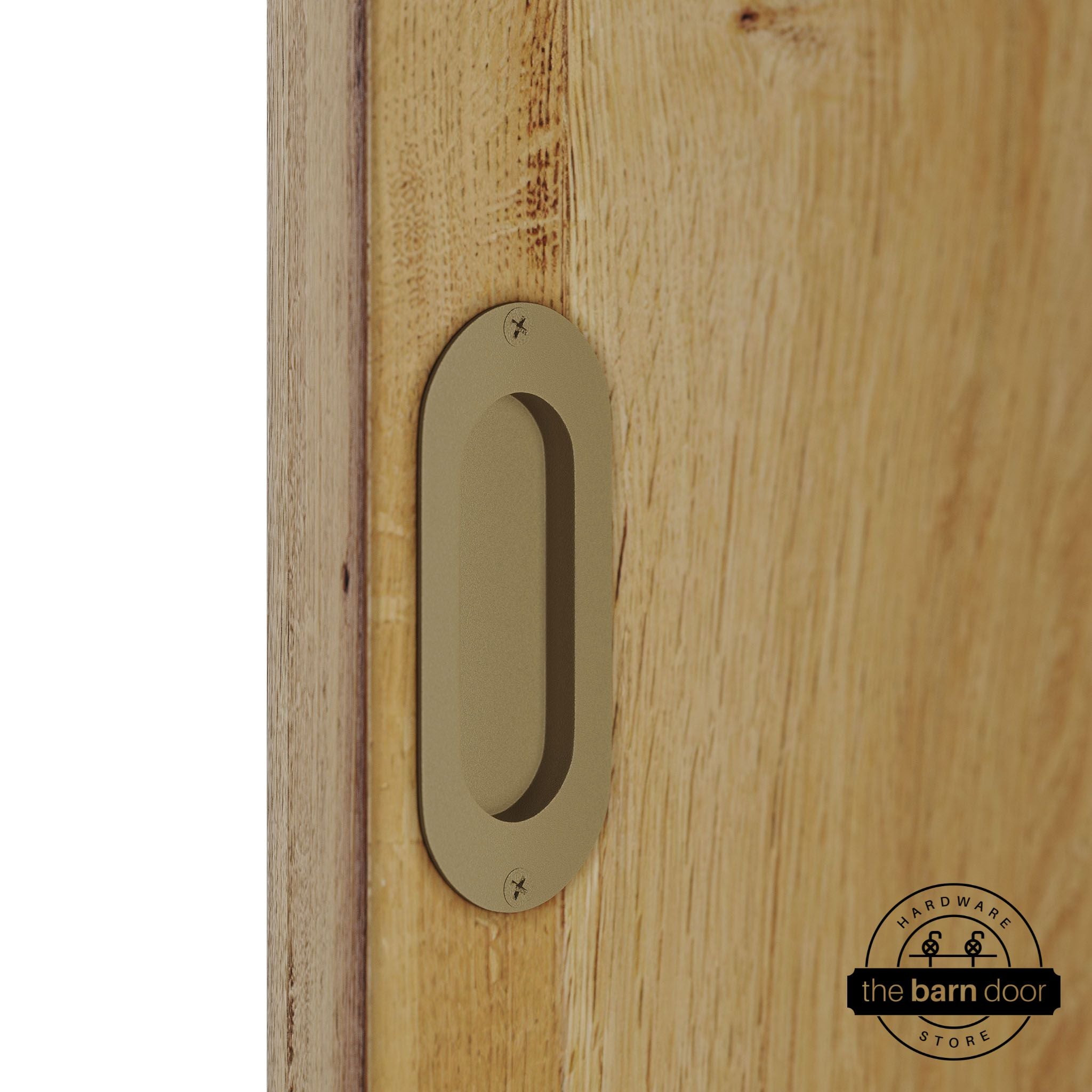 Wooden door with a gold flush pull handle.